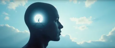 Surreal Silhouette Of A Person Walking Into A Light