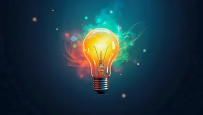 Glowing Light Bulb With Abstract Colorful Energy Trails