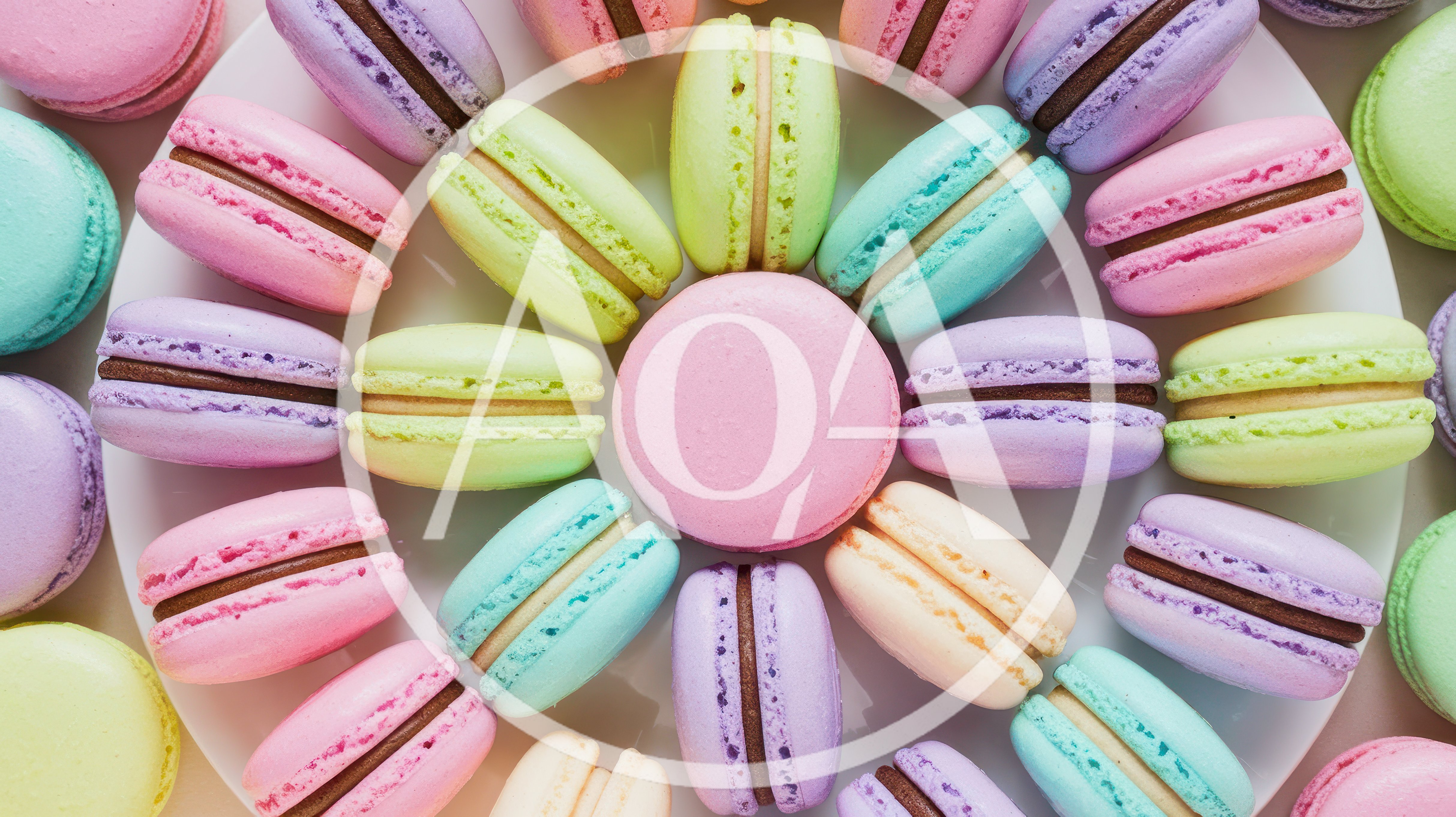 Assorted Colorful French Macarons Arranged On A Plate