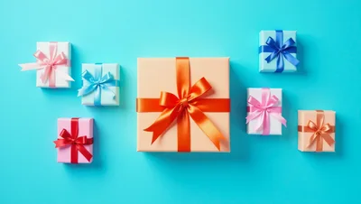 Top View Of Assorted Gift Boxes On Blue Background