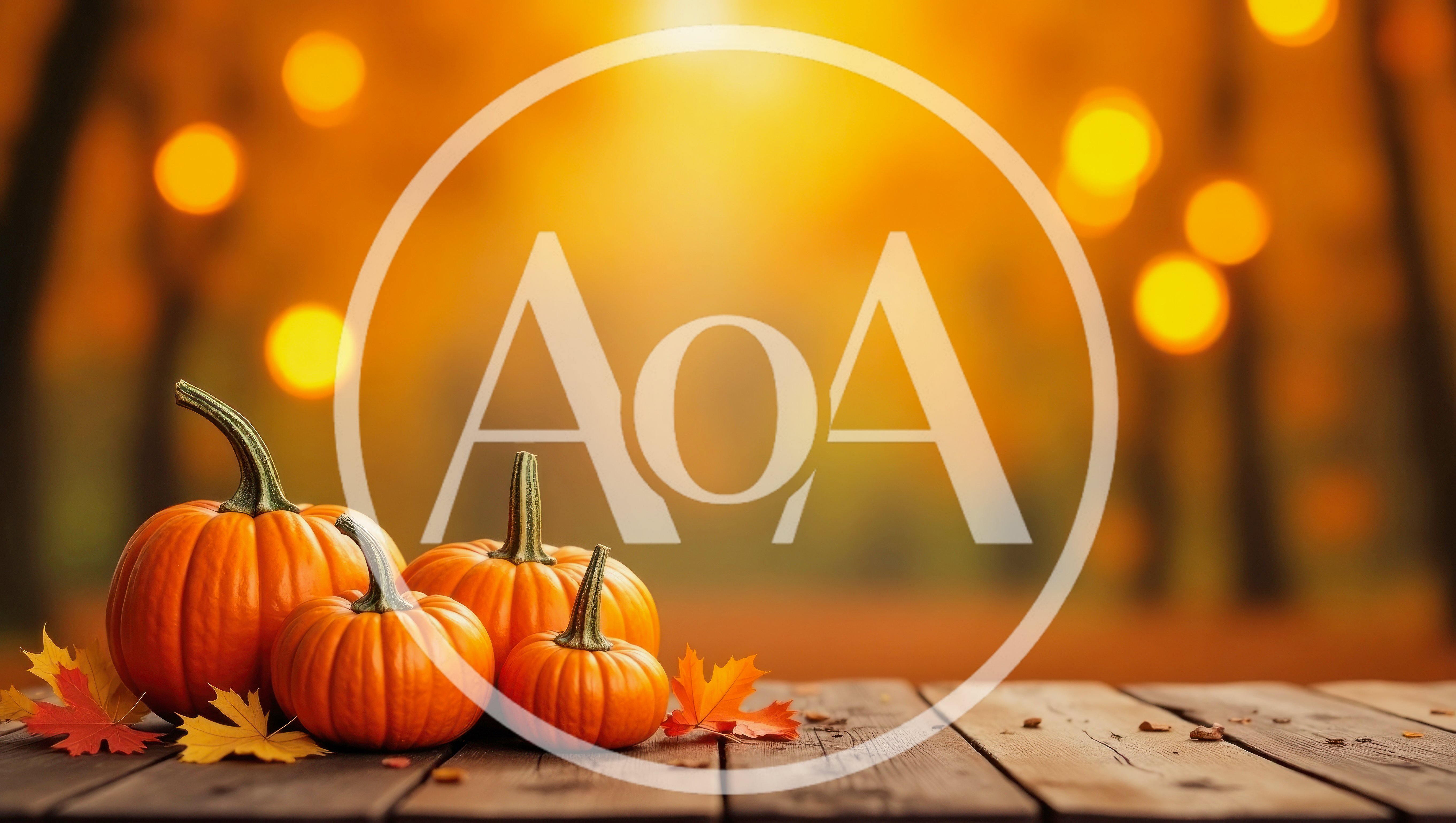 Autumn Pumpkins On A Rustic Wooden Table