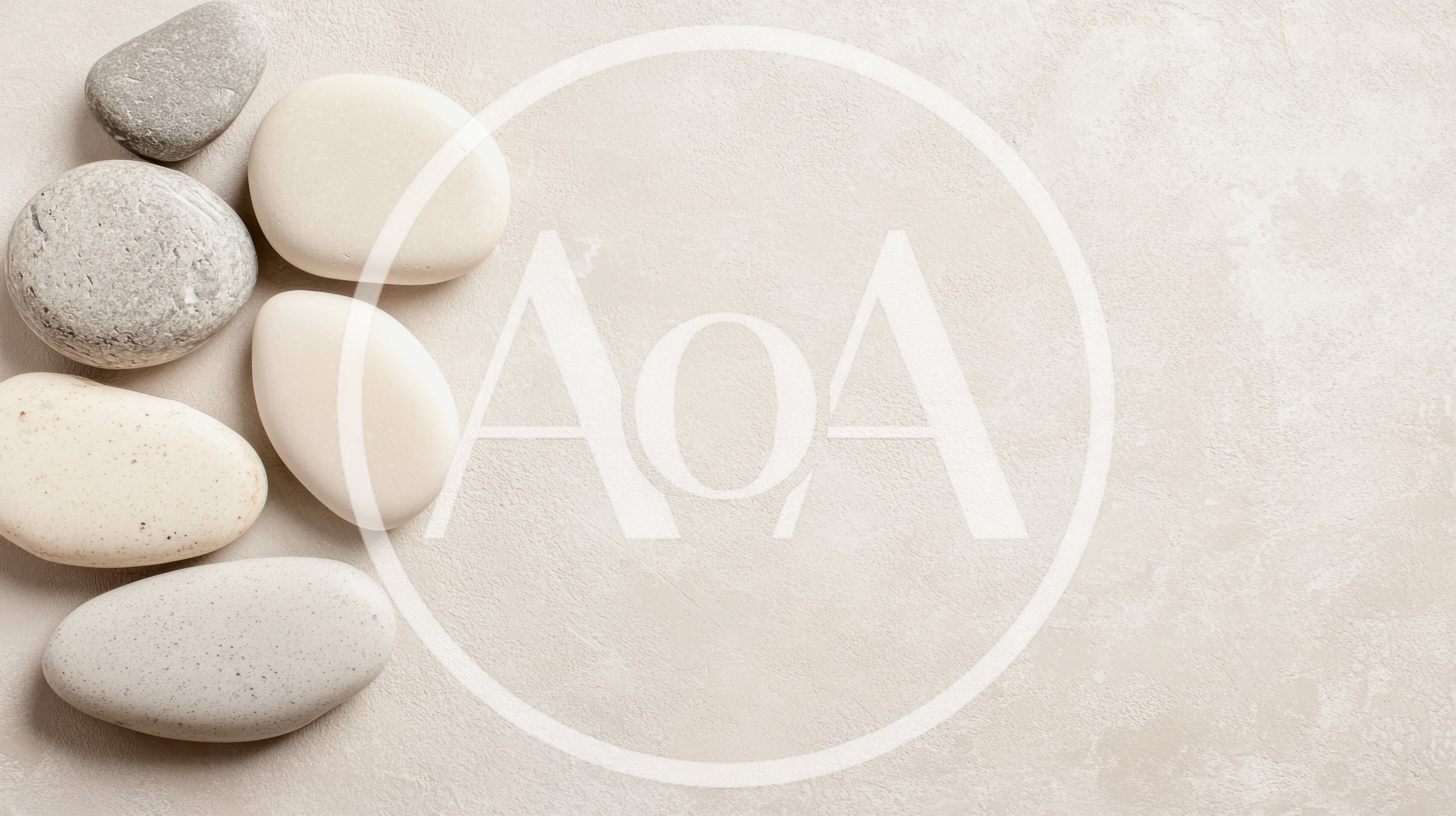 Smooth White and Grey Stones on Textured Background