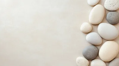 Smooth Polished Stones Arranged On A Neutral Background