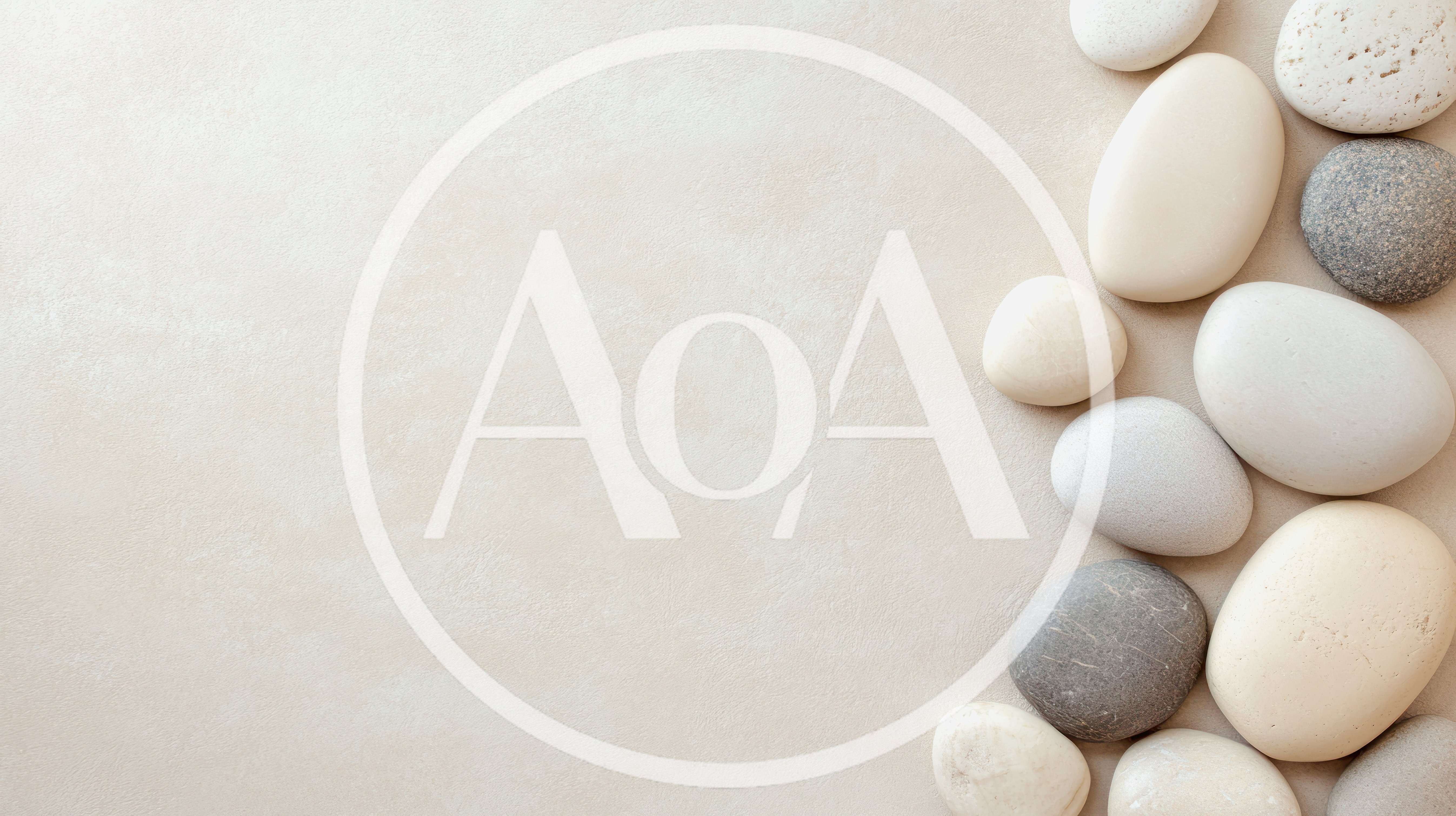 Smooth Polished Stones Arranged On A Neutral Background