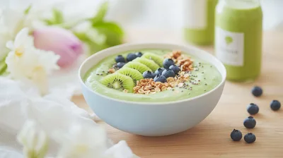 Green Smoothie Bowl With Kiwi And Blueberries