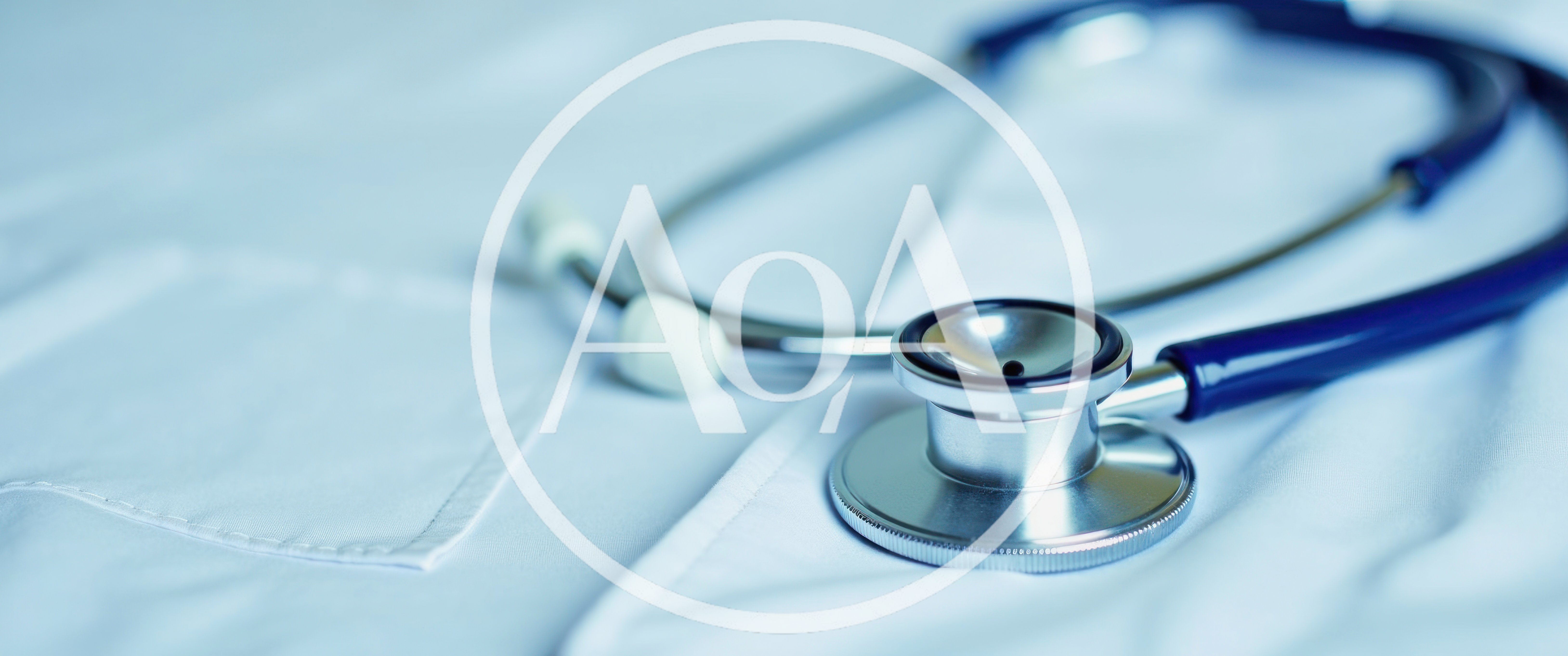 Medical Stethoscope Resting On A White Lab Coat