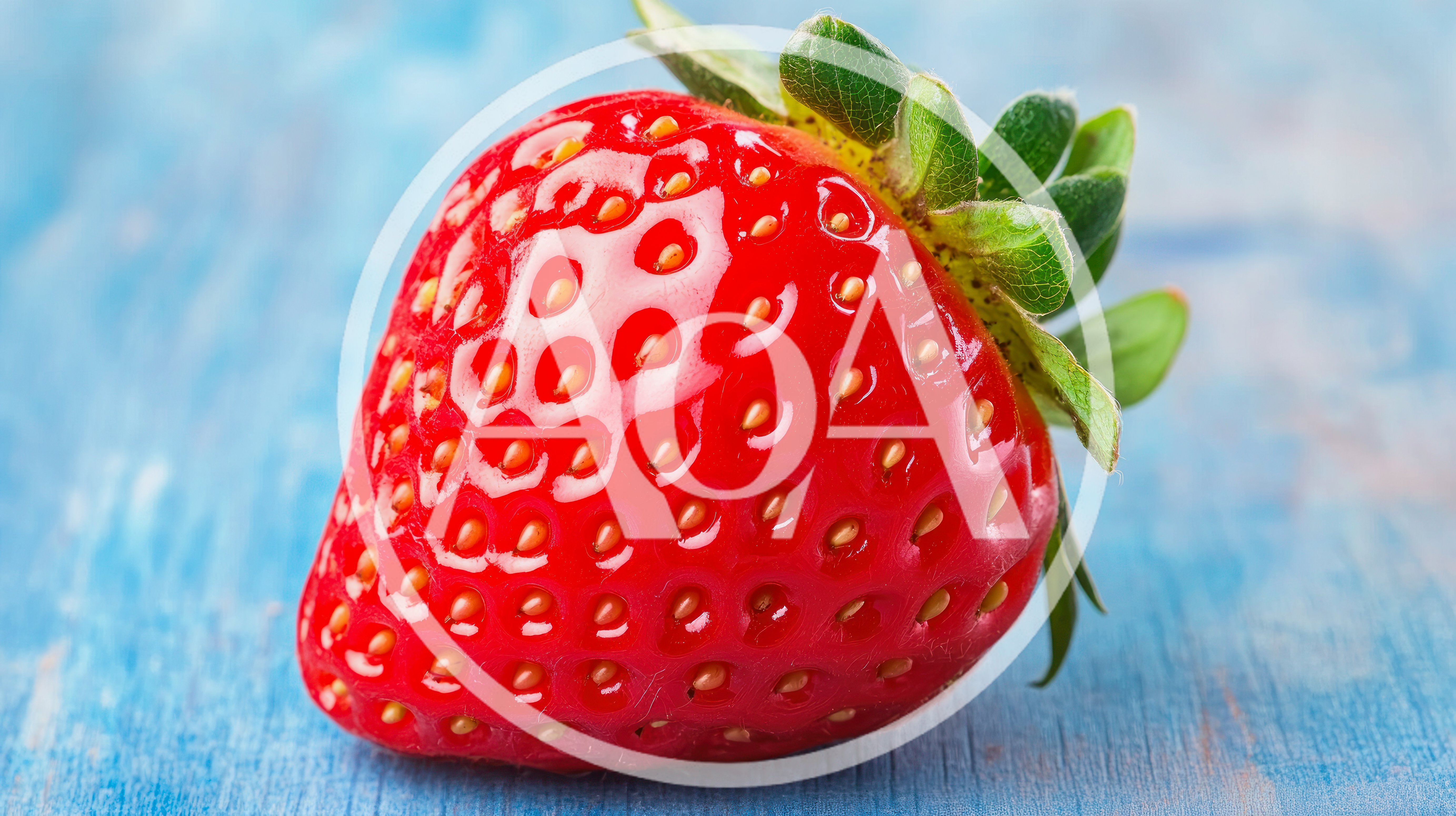 Fresh Ripe Strawberry On A Blue Wooden Surface