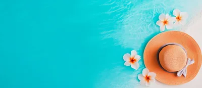 Summer Beach Hat With Plumeria Flowers On Sand