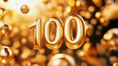 Golden Number One Hundred Floating In Bokeh Background