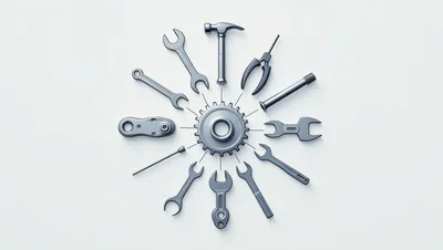 Assorted Metal Hand Tools Arranged Around A Central Gear