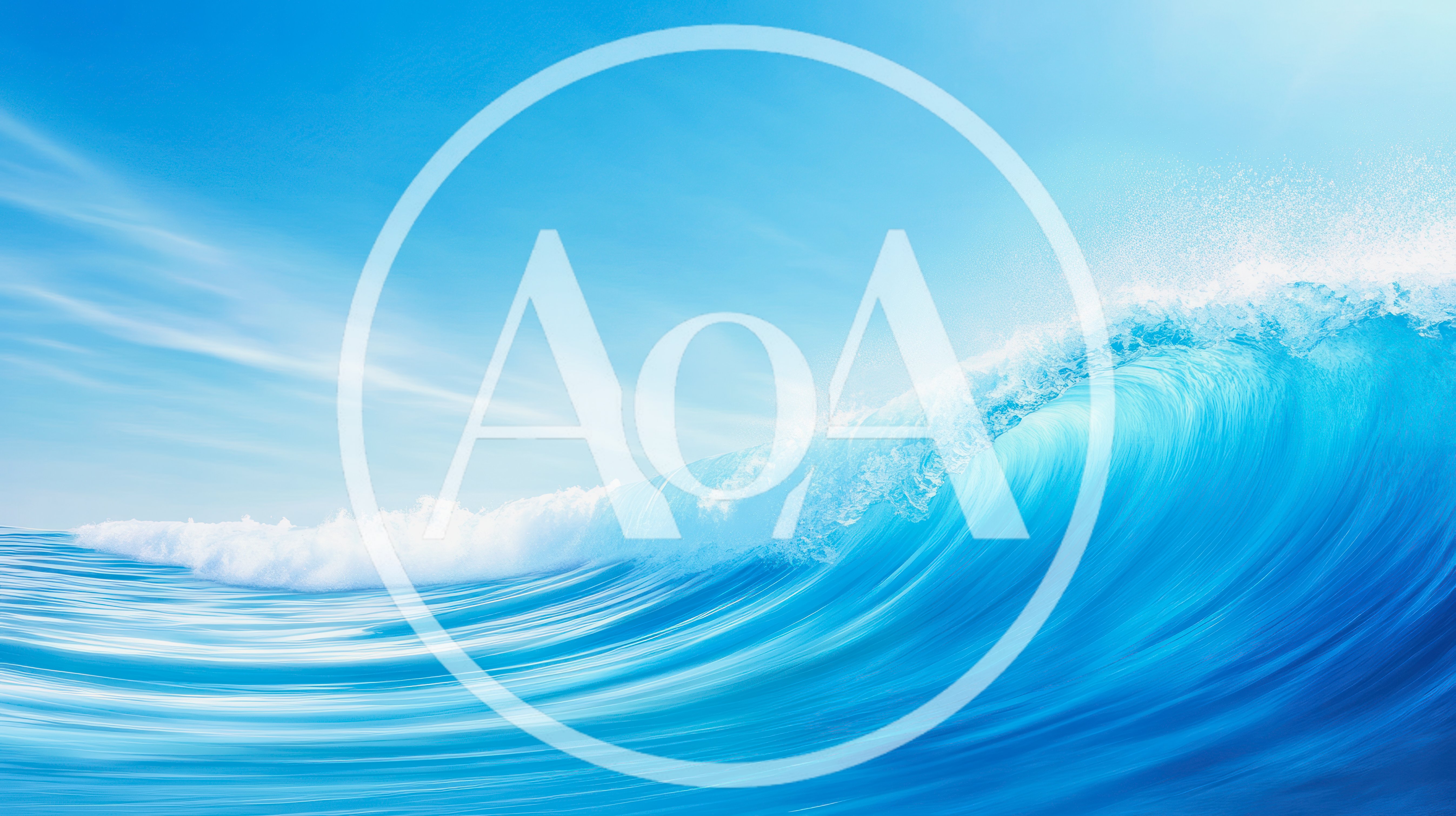 Large Crashing Ocean Wave Under Clear Blue Sky