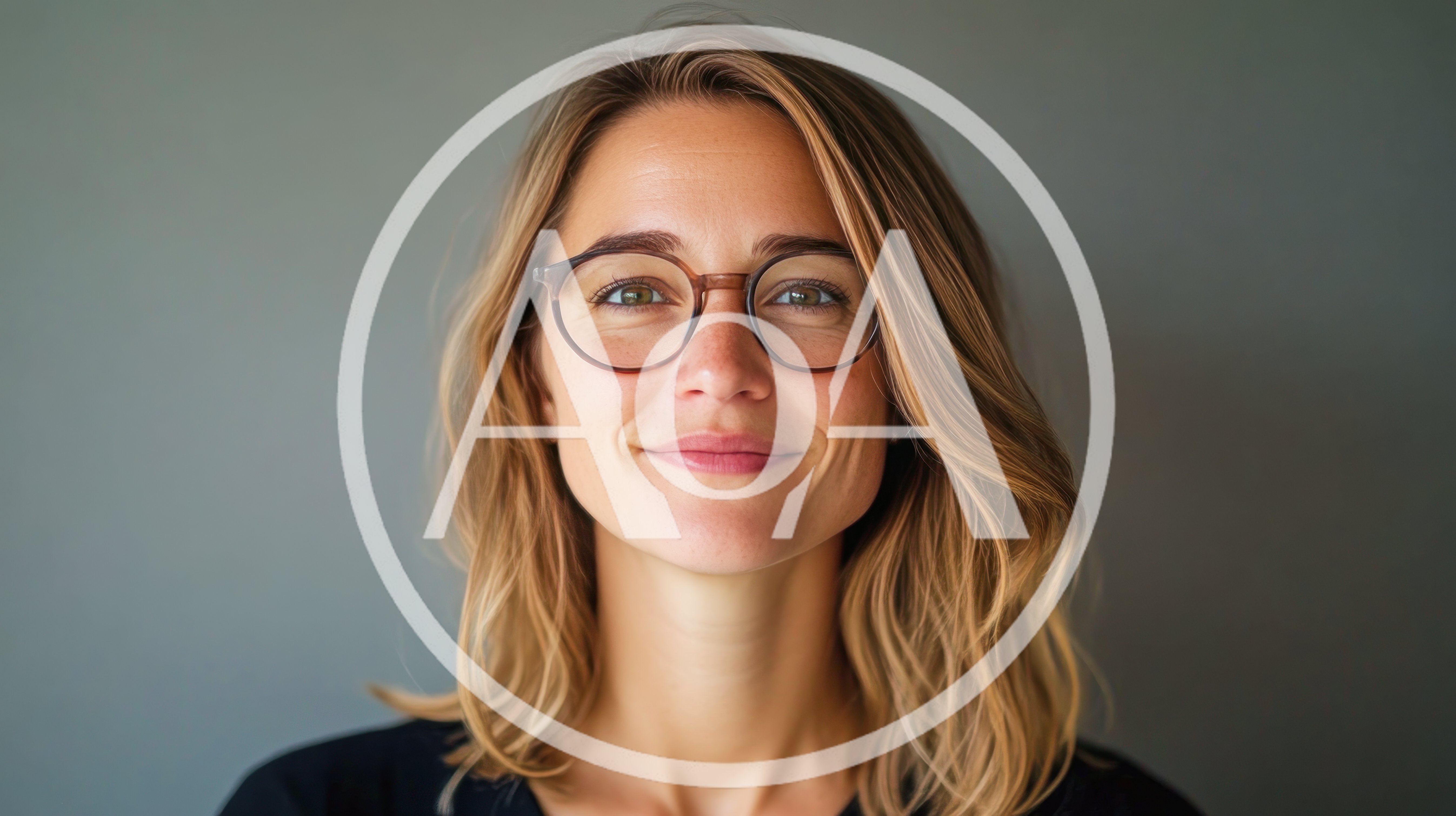 Portrait Of A Smiling Woman Wearing Glasses