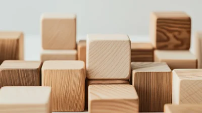 Arrangement Of Natural Wooden Cubes On White Background