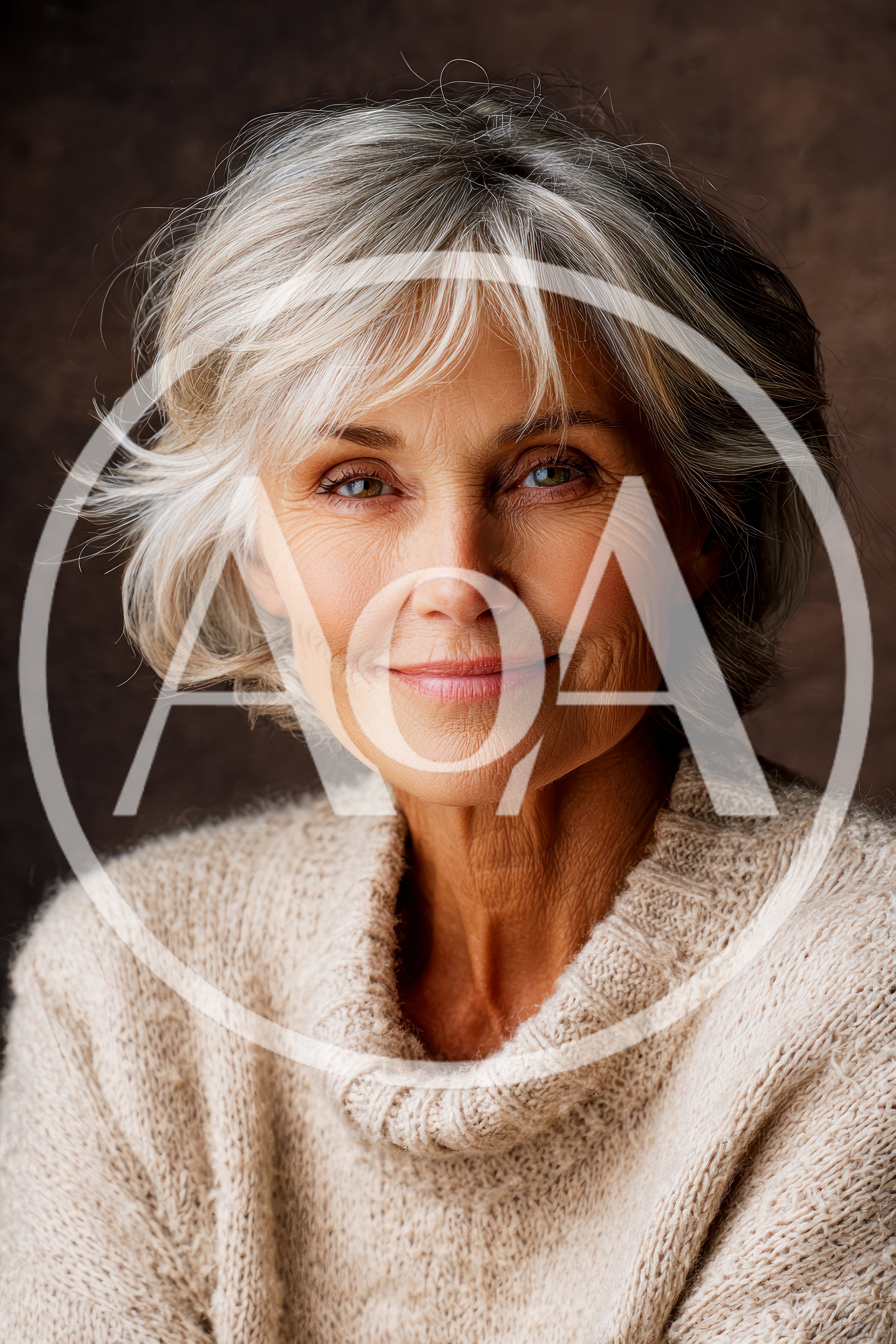 Portrait Of A Smiling Mature Woman With Silver Hair