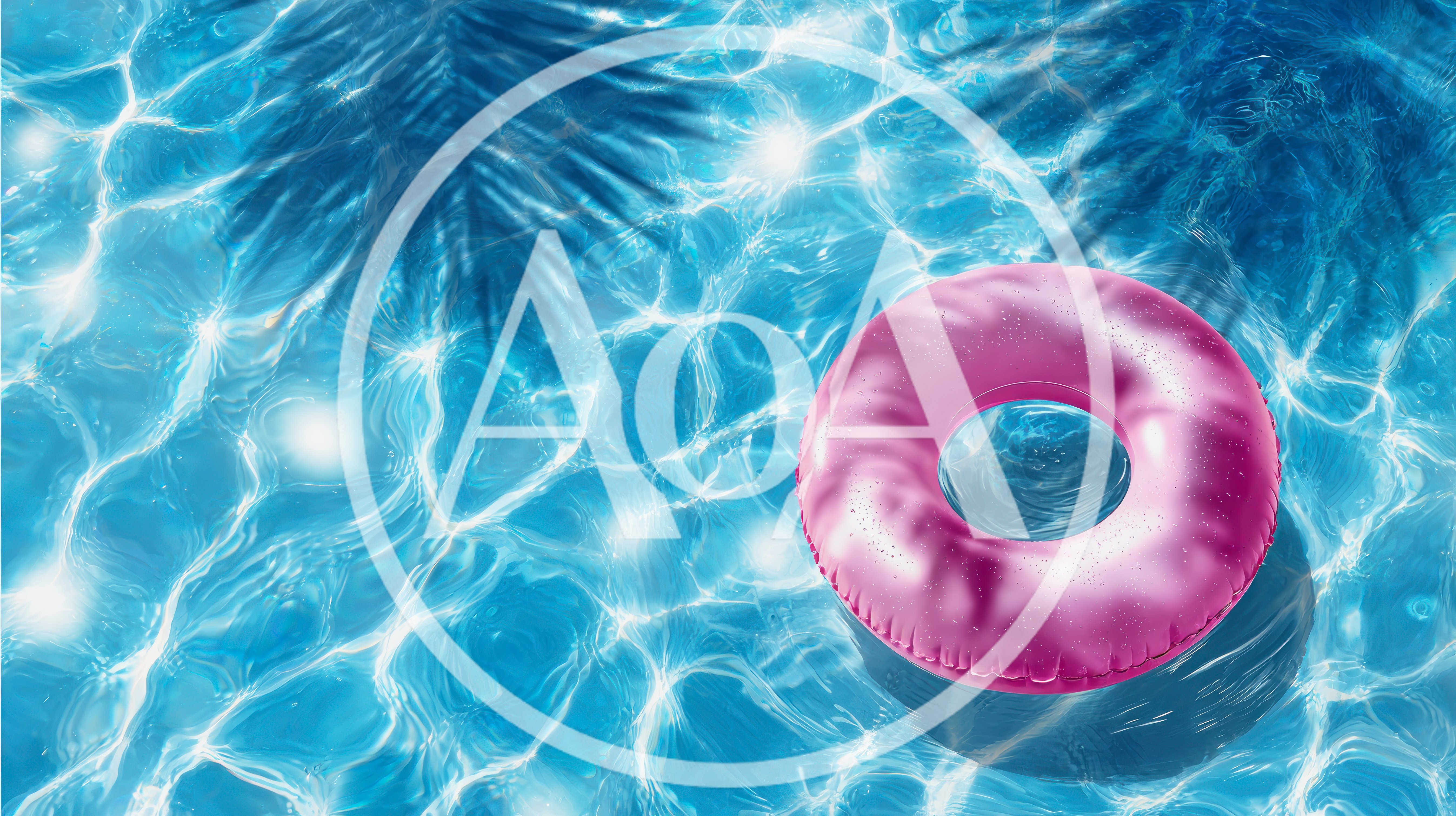 Pink Inflatable Pool Ring Floating On Water