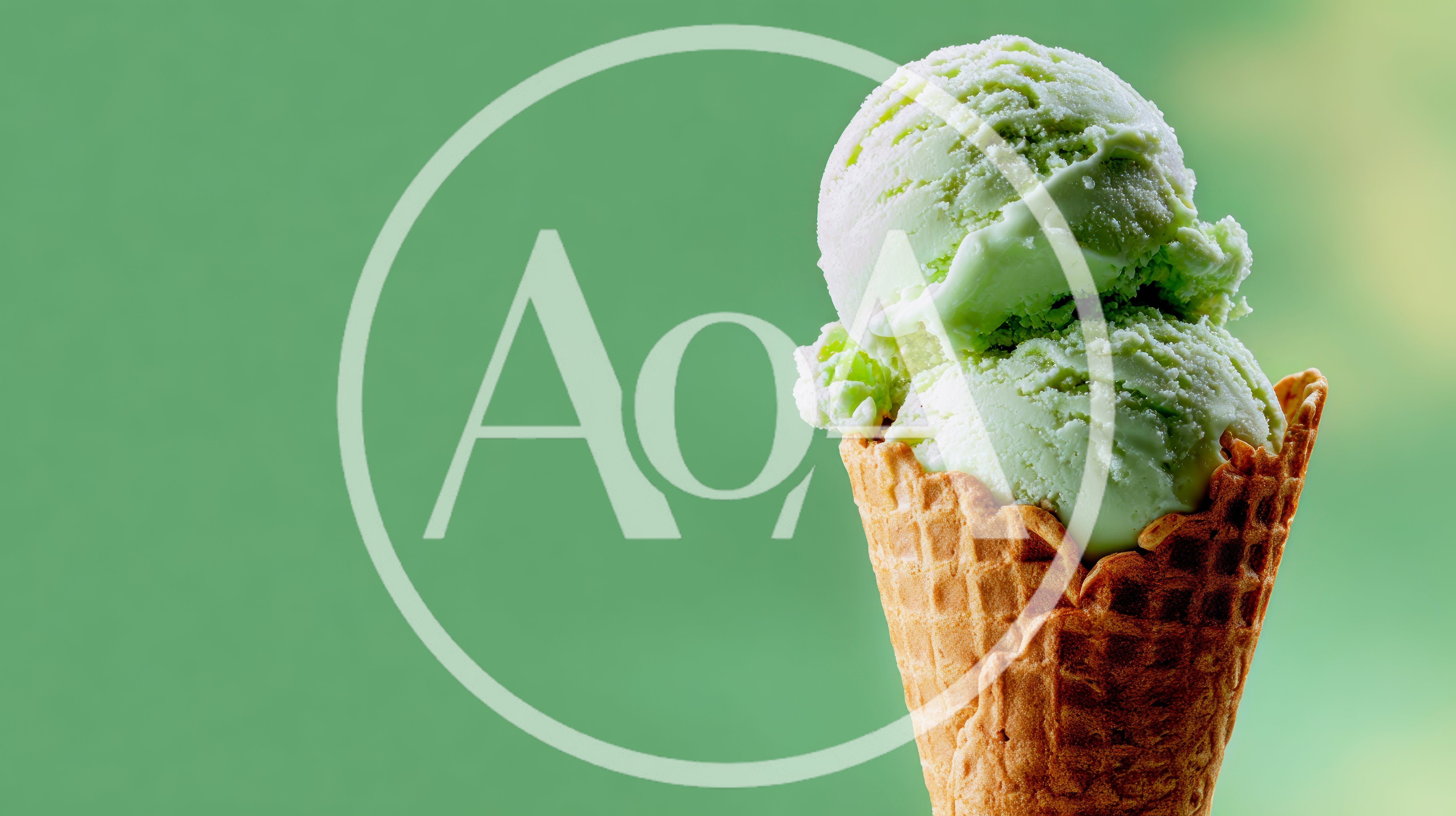 Two Scoops Of Green Ice Cream In Waffle Cone