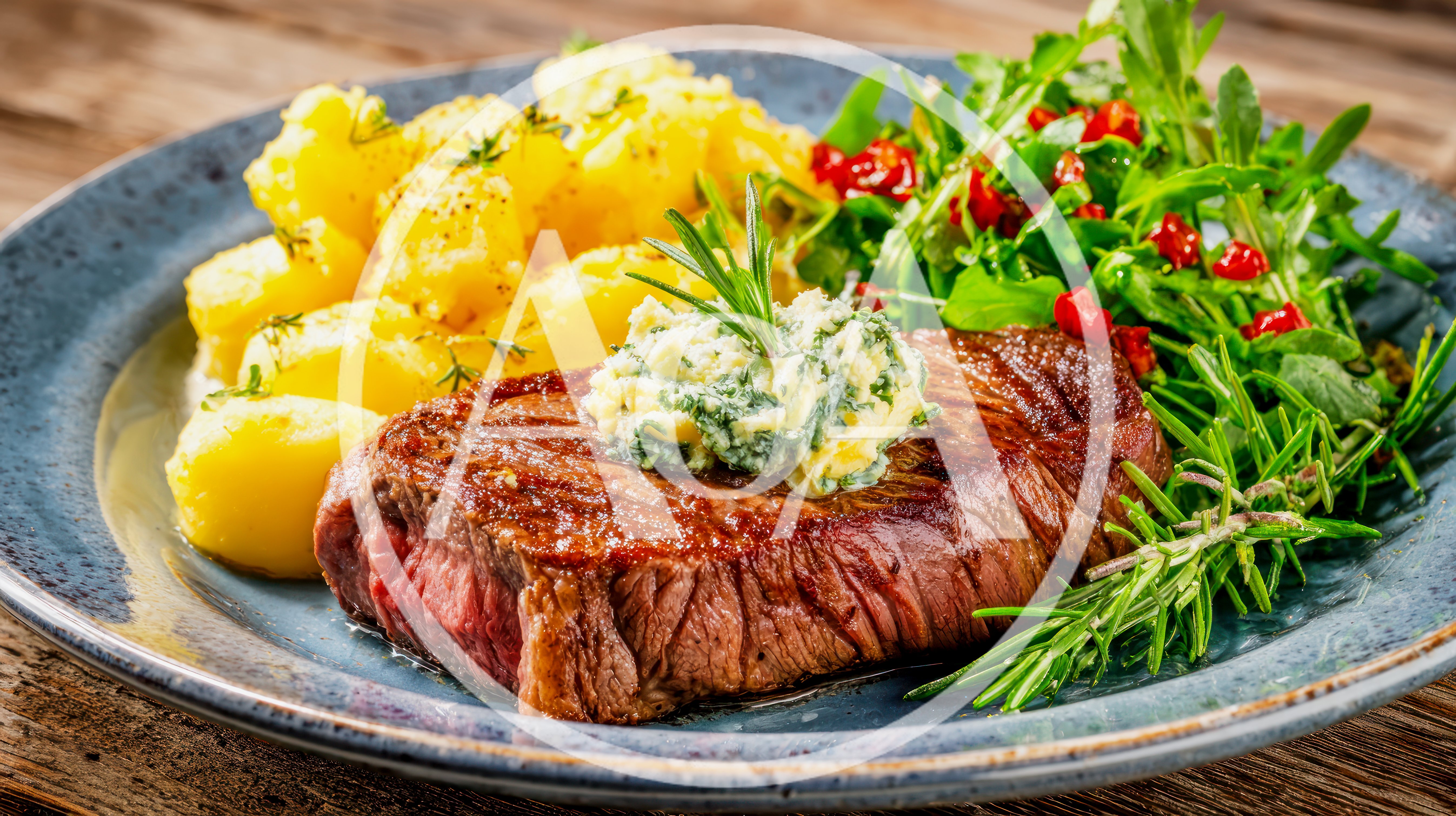 Grilled Beef Steak With Potatoes And Fresh Salad