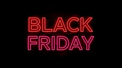Neon Black Friday Sign On Dark Brick Wall