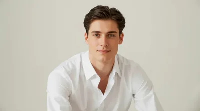 Portrait Of A Handsome Young Man In White Shirt