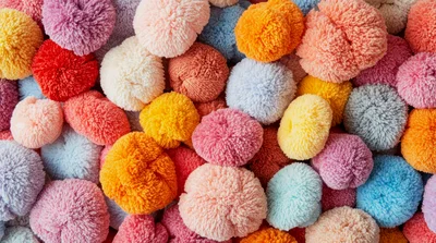 Colorful Assortment Of Soft Yarn Pom Poms