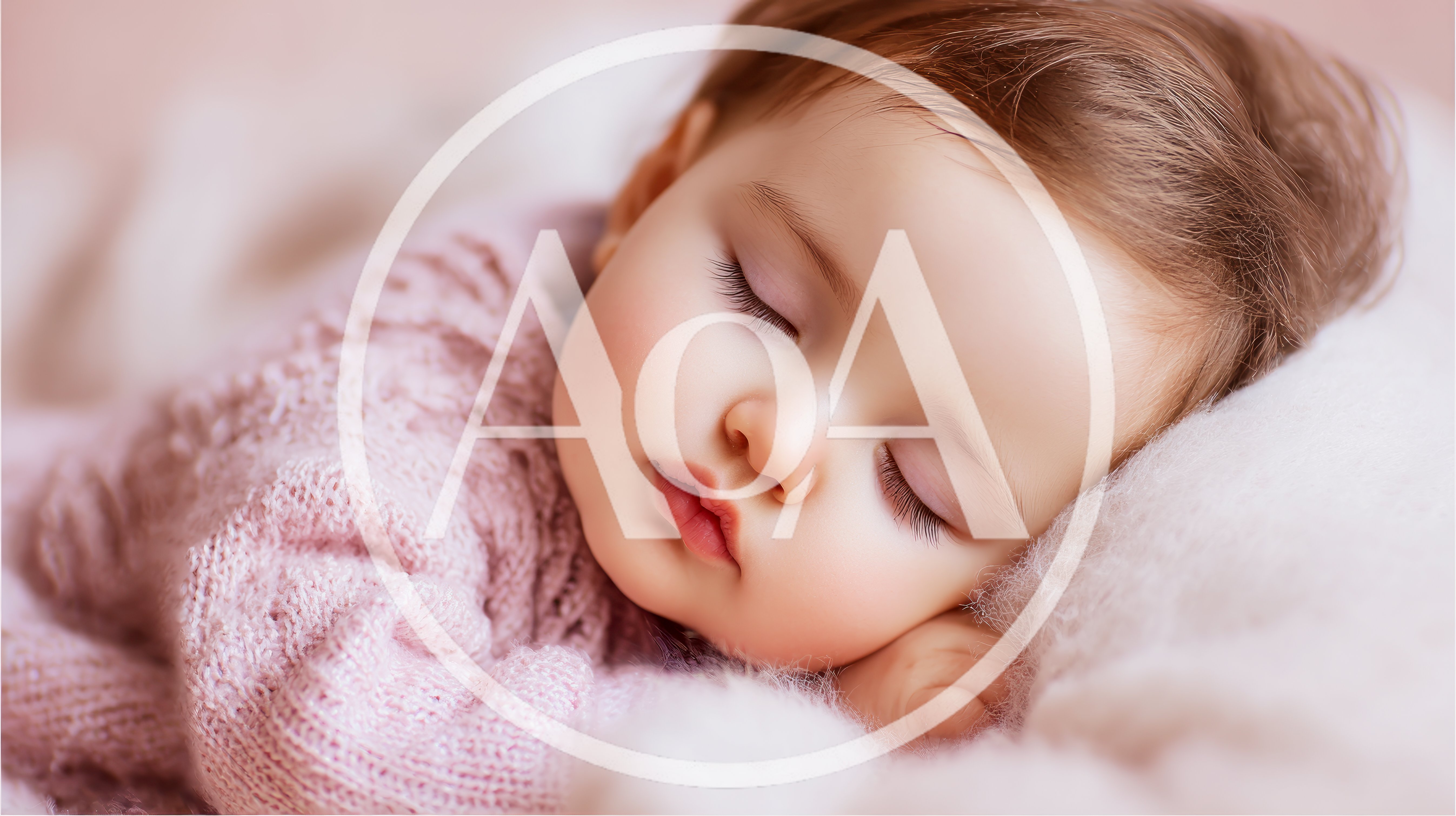 Sleeping Baby In A Soft Pink Knitted Sweater