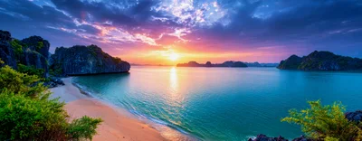 Stunning Sunset Over Tropical Limestone Islands In Ha Long Bay
