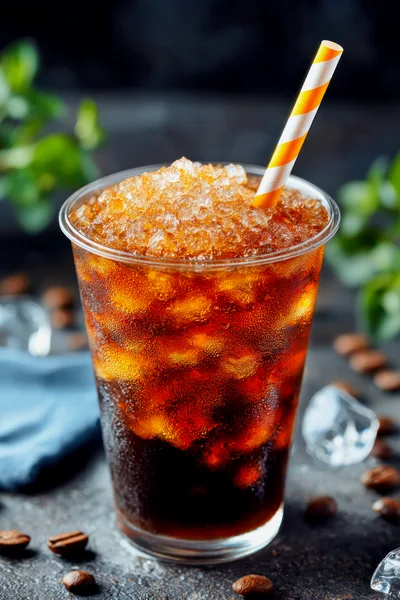 Iced Coffee In A Plastic Cup With Straw