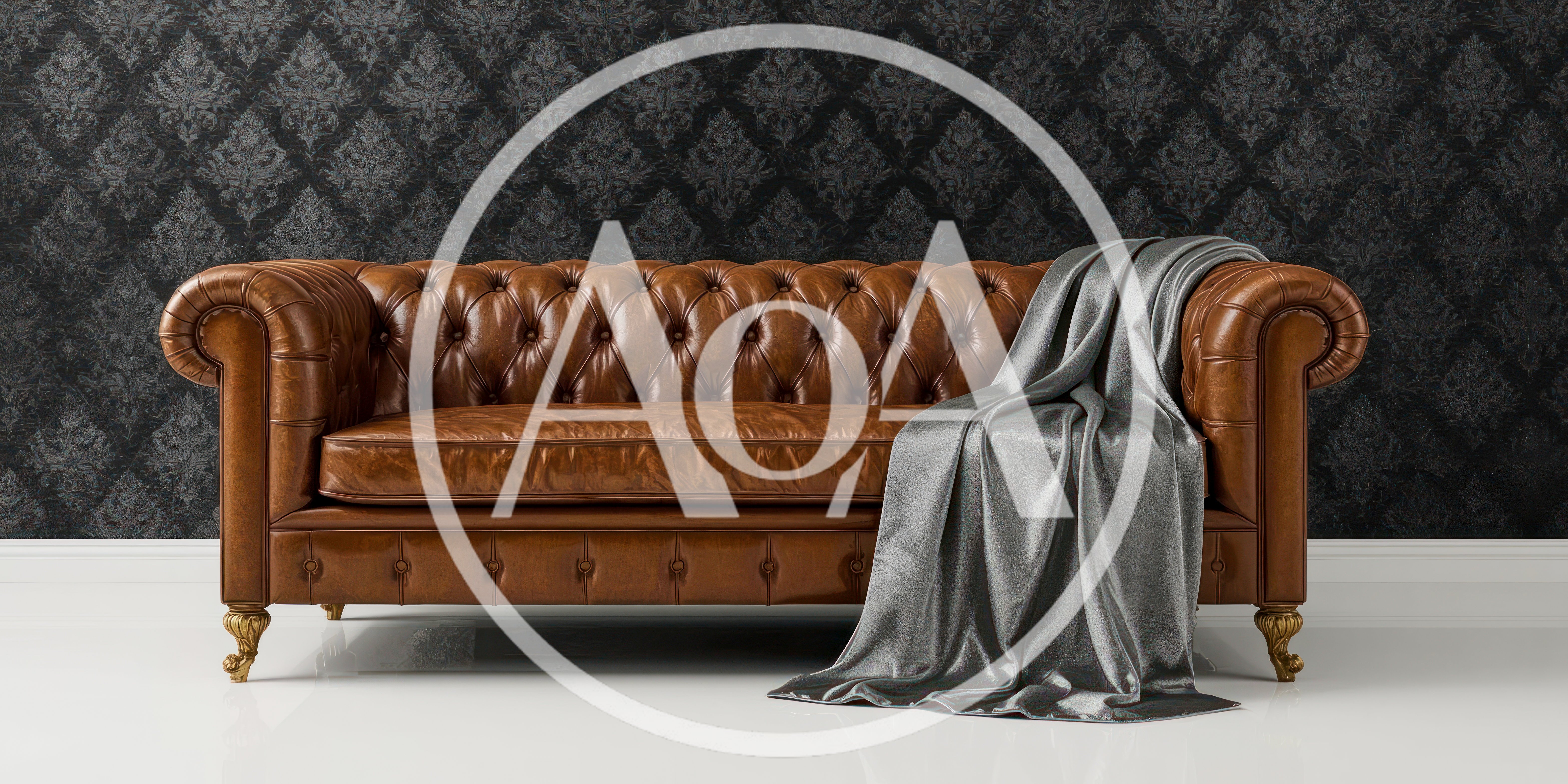 Brown Leather Chesterfield Sofa With Grey Throw Blanket