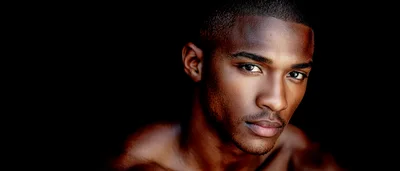 Portrait Of A Handsome Young Man With Dark Skin