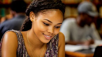 Young Woman Studying In A Library