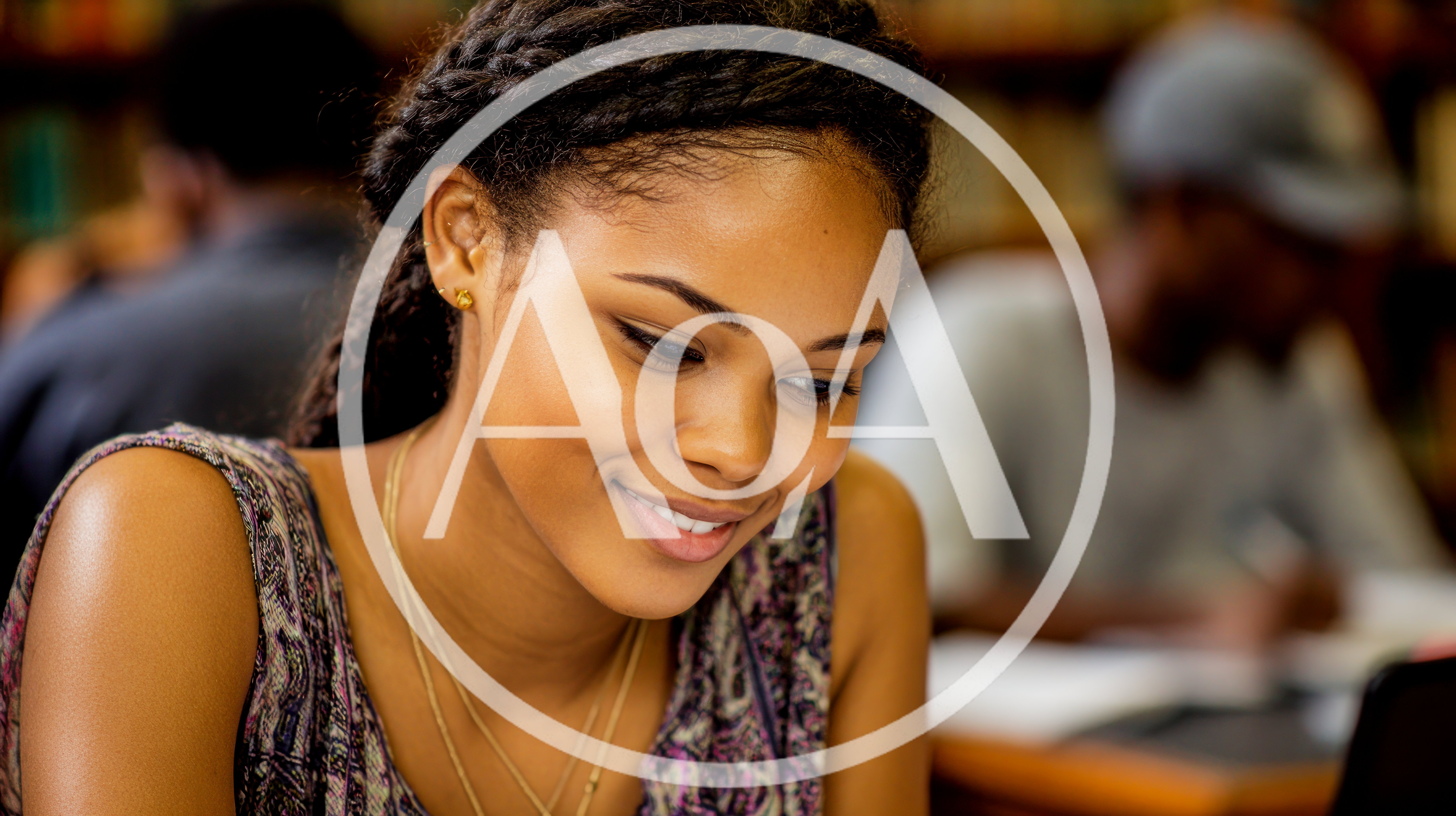 Young Woman Studying In A Library