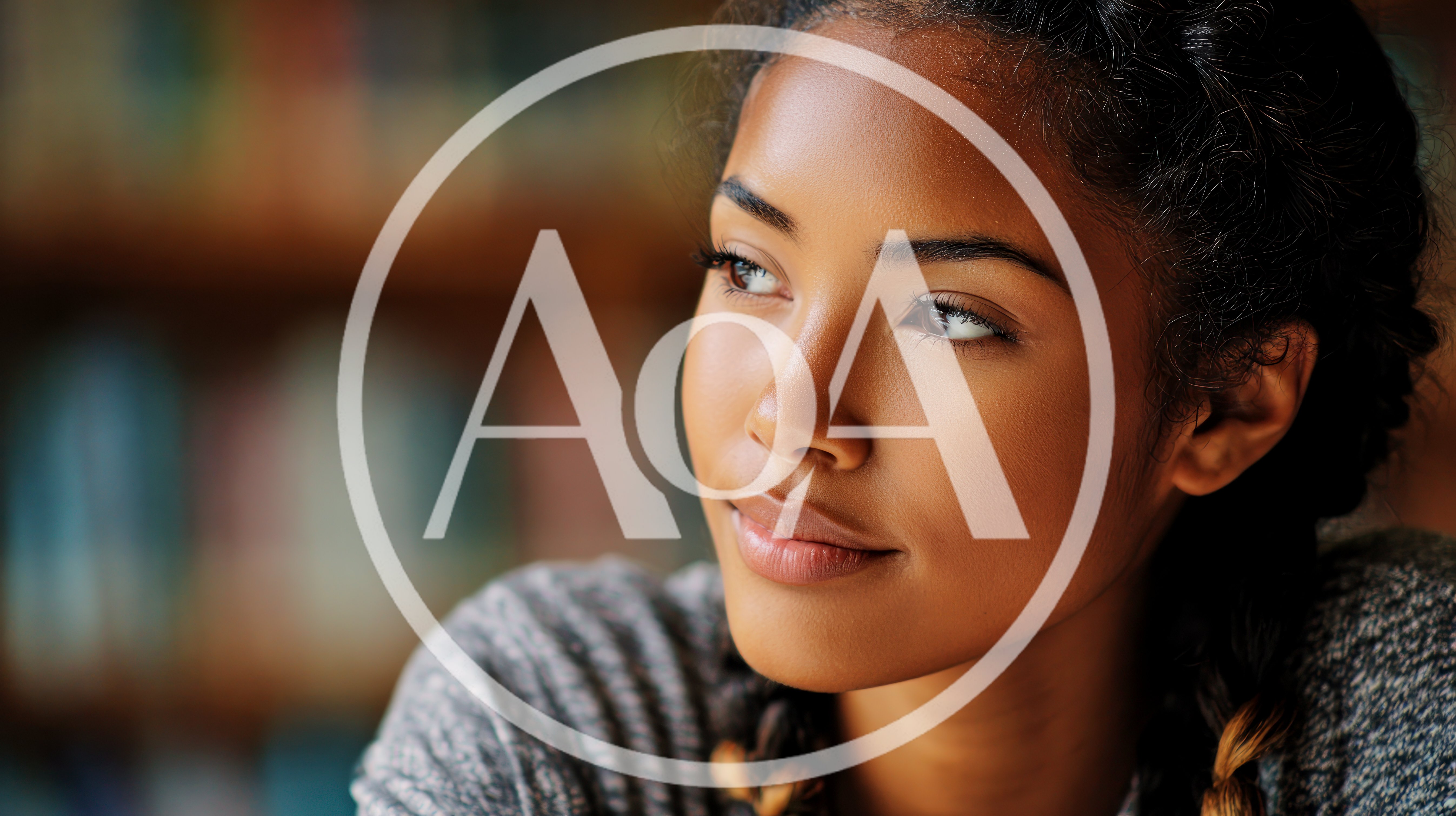 Young Woman Looking Away Thoughtfully In A Library