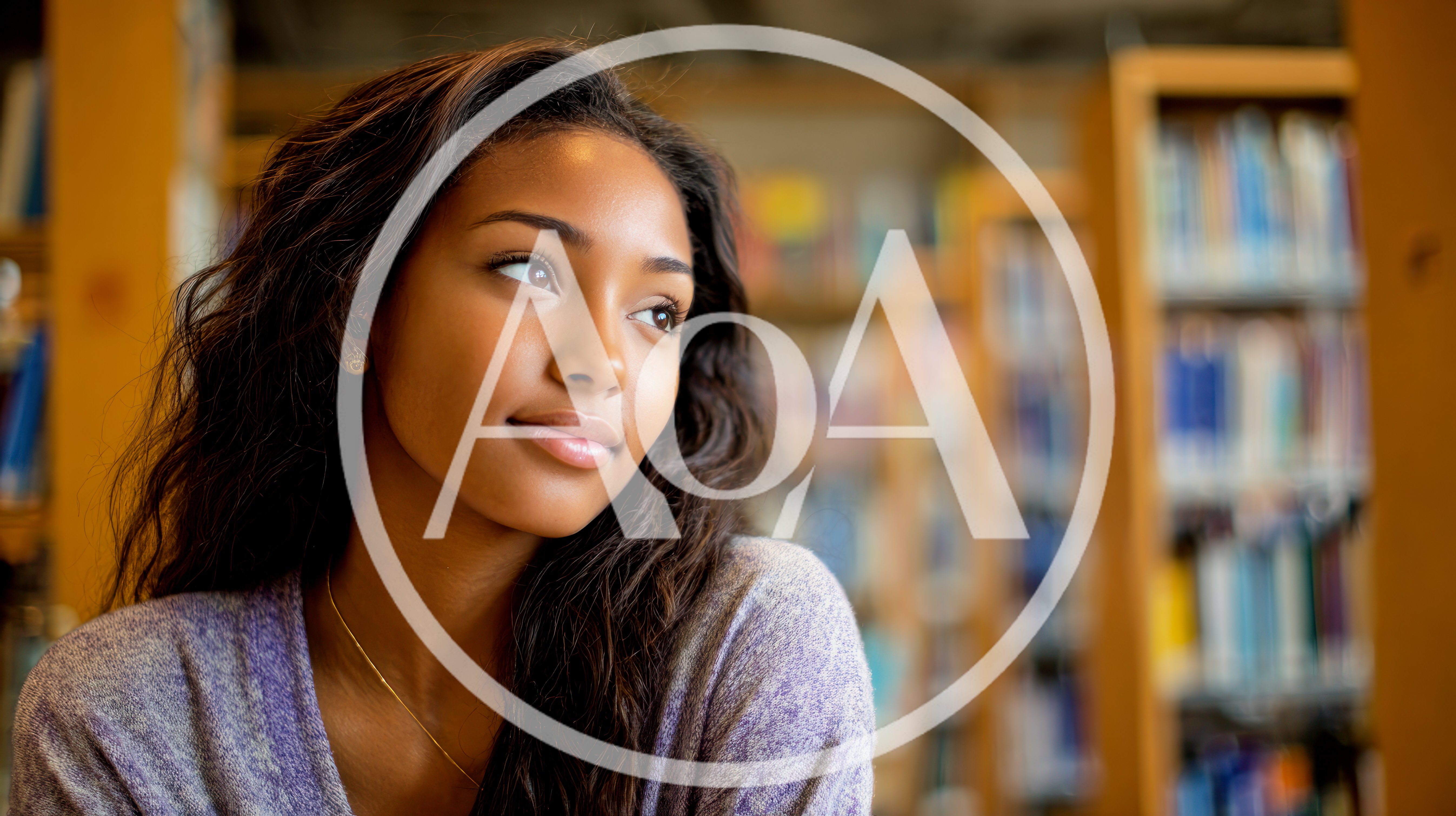 Young Woman Thinking In A Library Setting