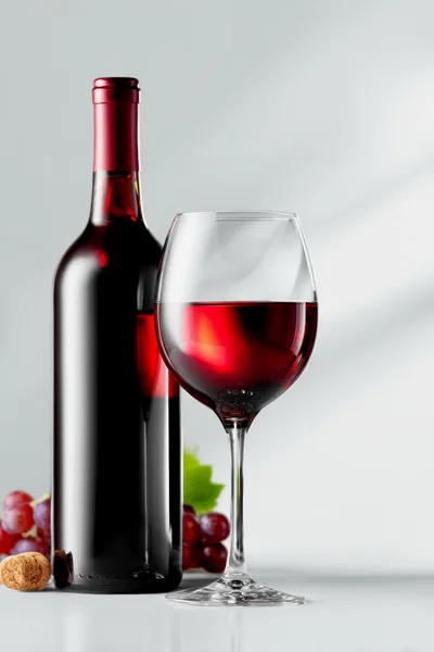 Red Wine Bottle and Glass with Grapes