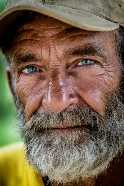 Close Up Portrait Of An Elderly Man With Blue Eyes