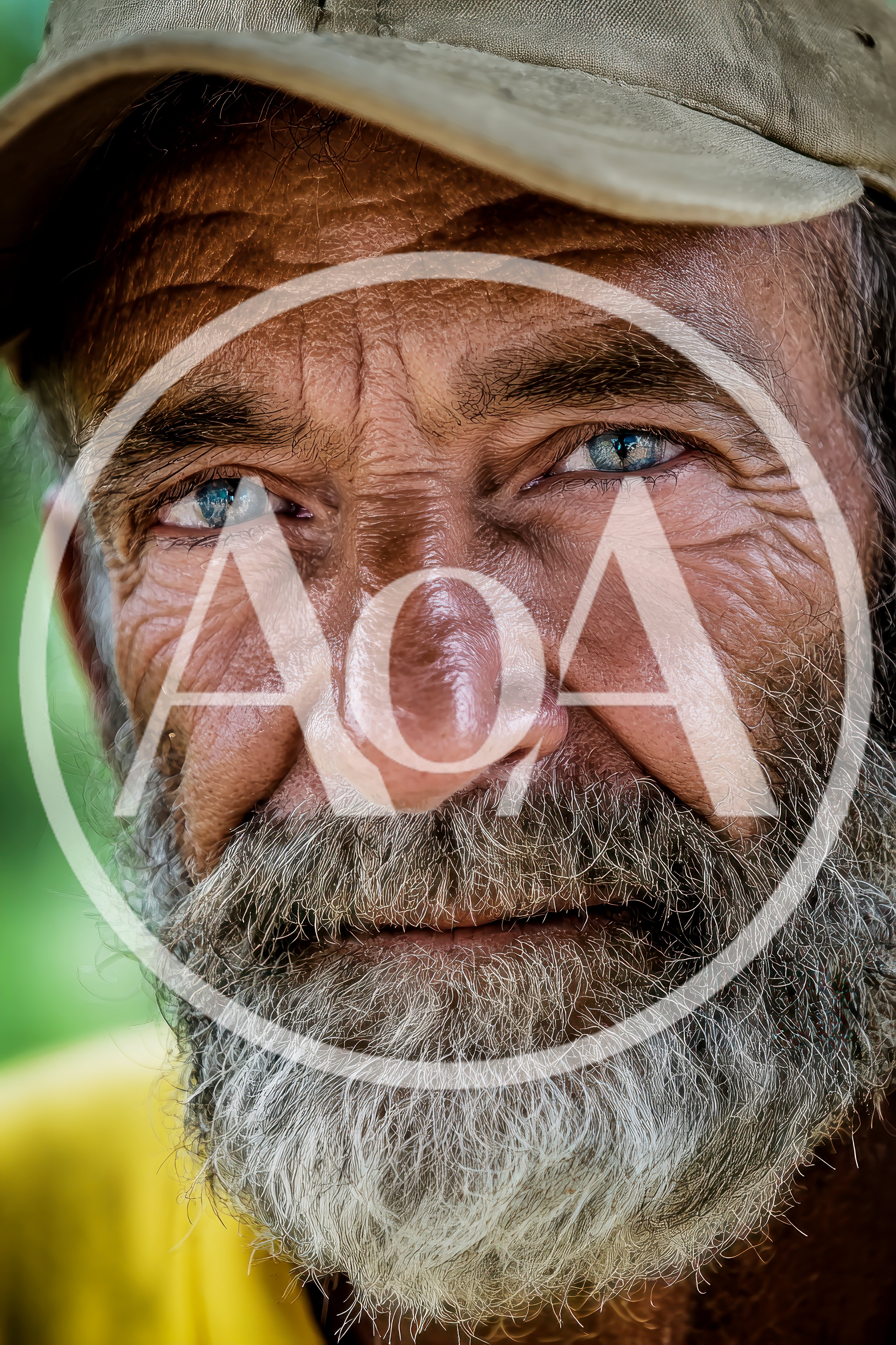Close Up Portrait Of An Elderly Man With Blue Eyes