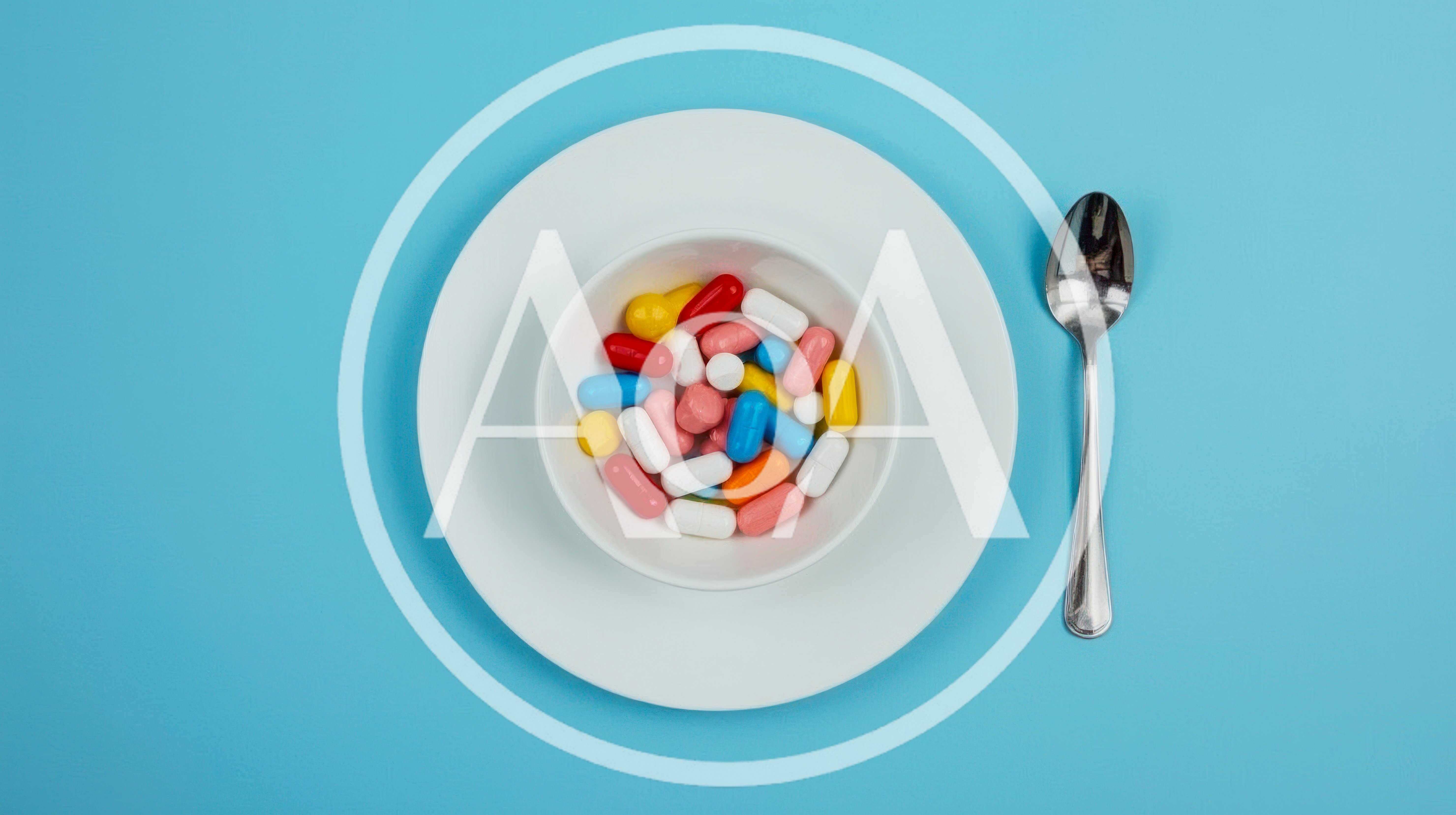 Bowl Of Assorted Colorful Pills On A Plate
