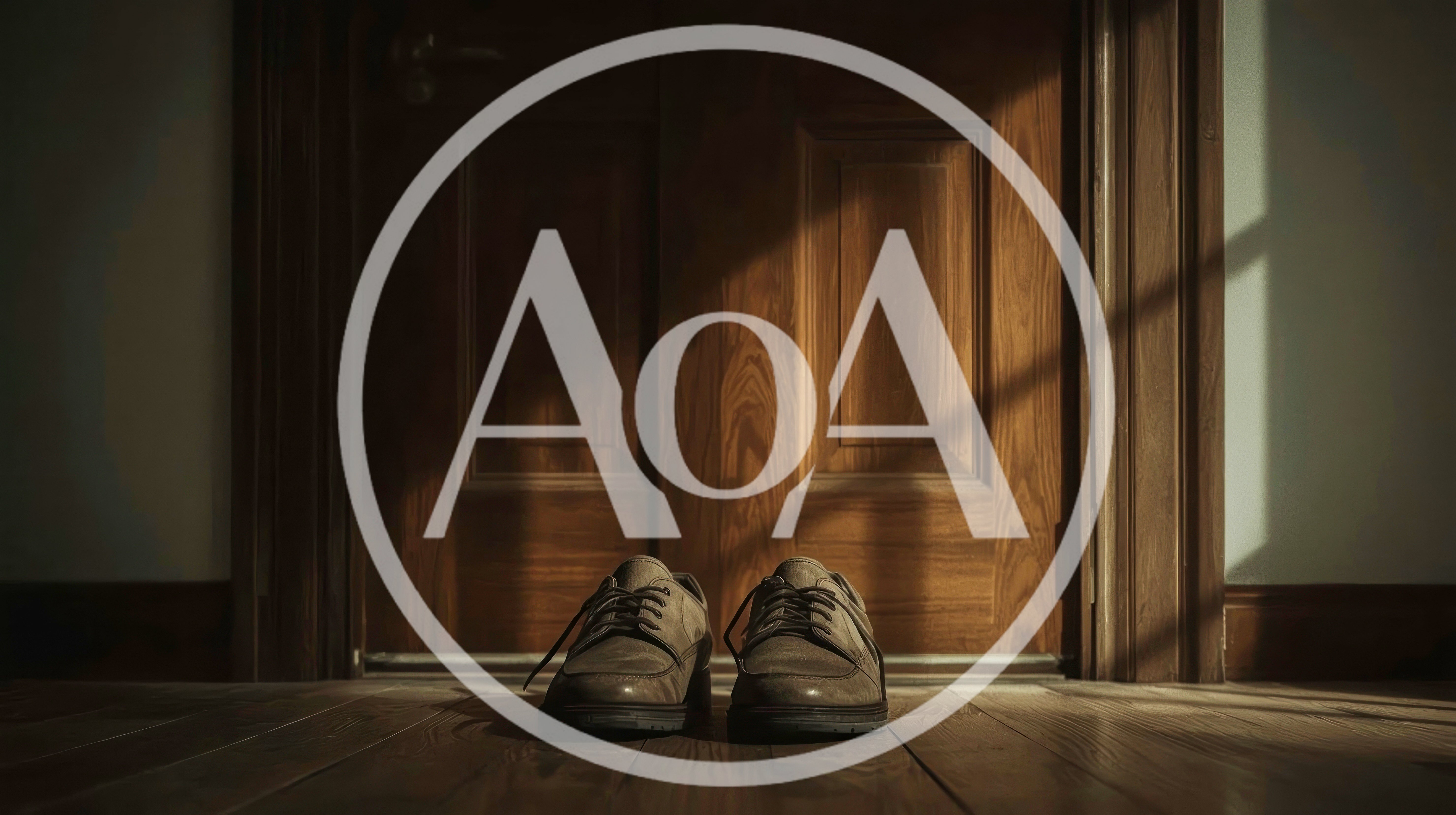 Pair Of Brown Leather Shoes On Wooden Floor