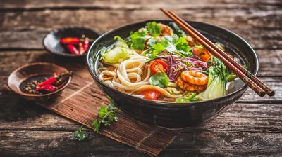 Bowl Of Shrimp Noodle Soup With Chopsticks