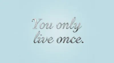 Silver Metallic Text You Only Live Once On Blue Background