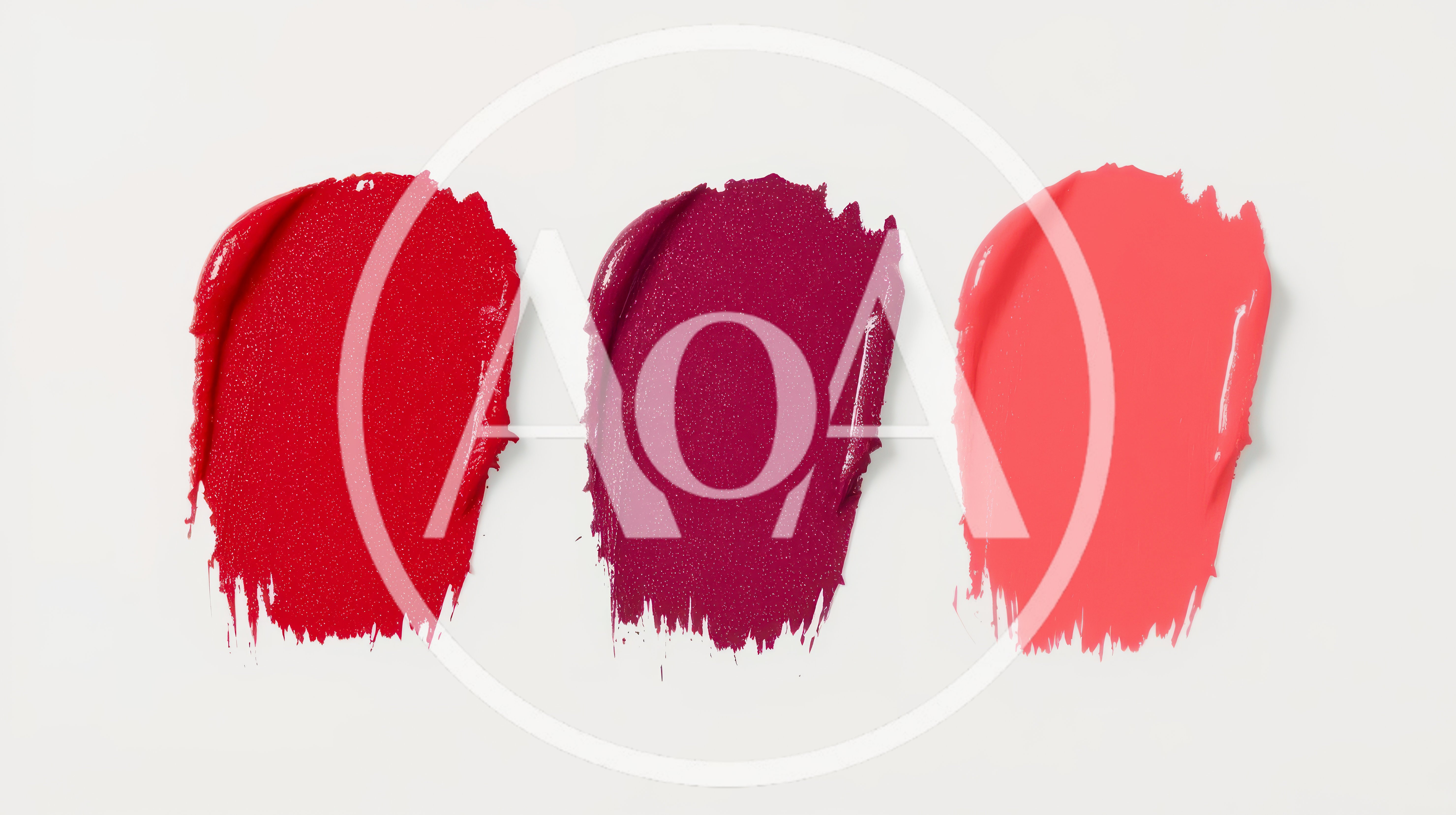 Three Vibrant Lipstick Swatches On White Background