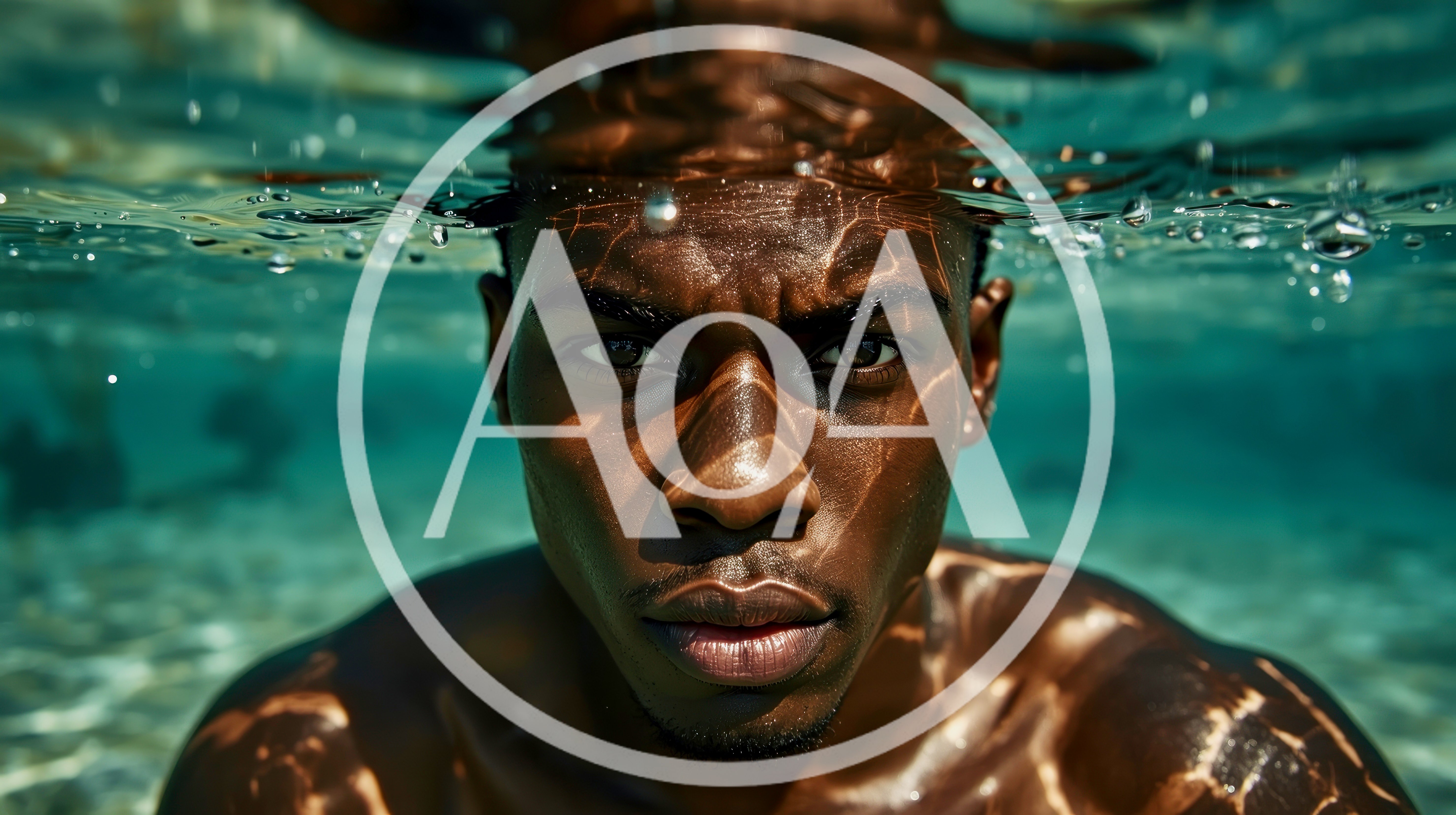 Young Black Man Swimming Underwater In Clear Tropical Water