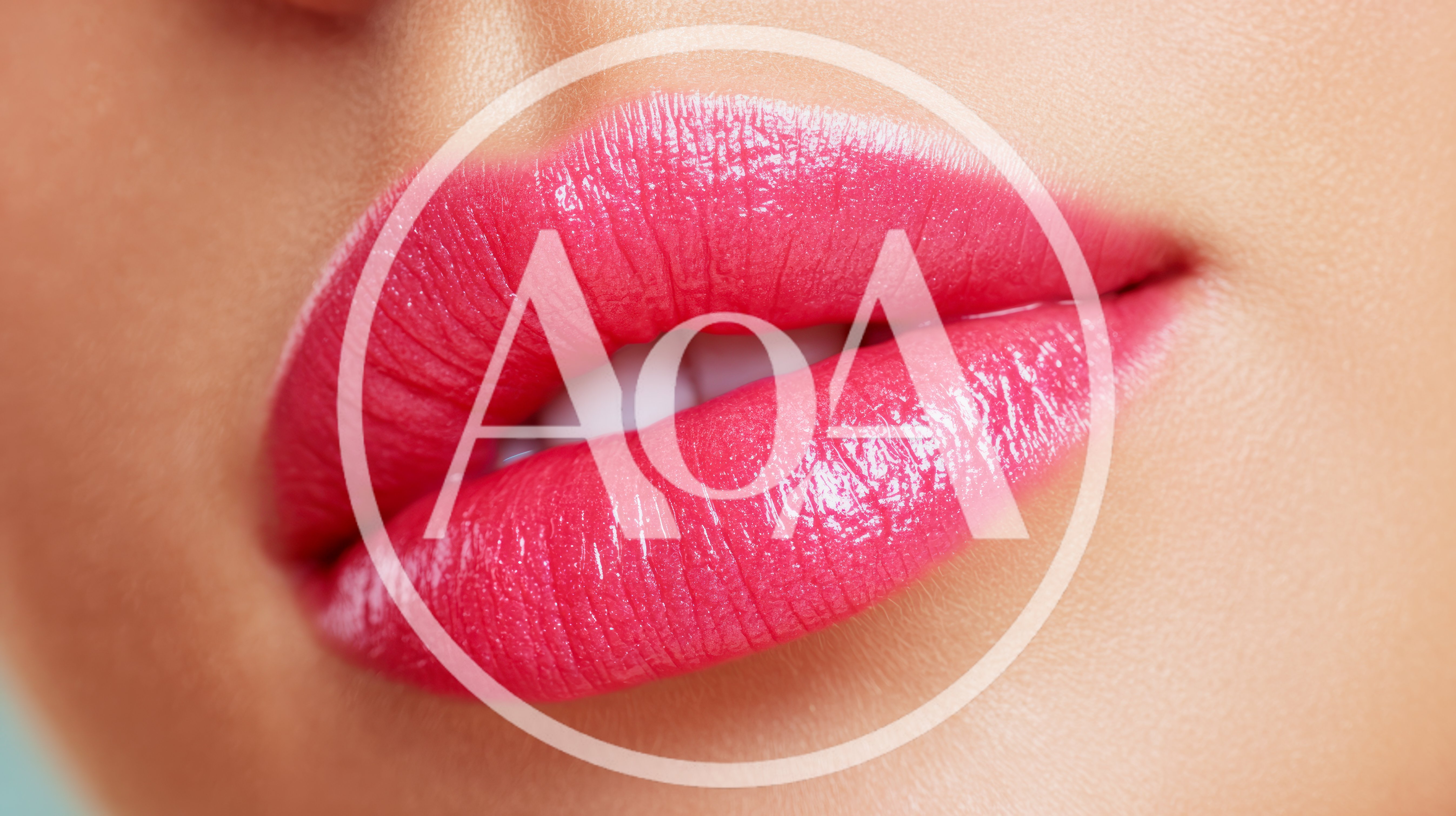 Close Up Of Woman Wearing Bright Pink Lipstick