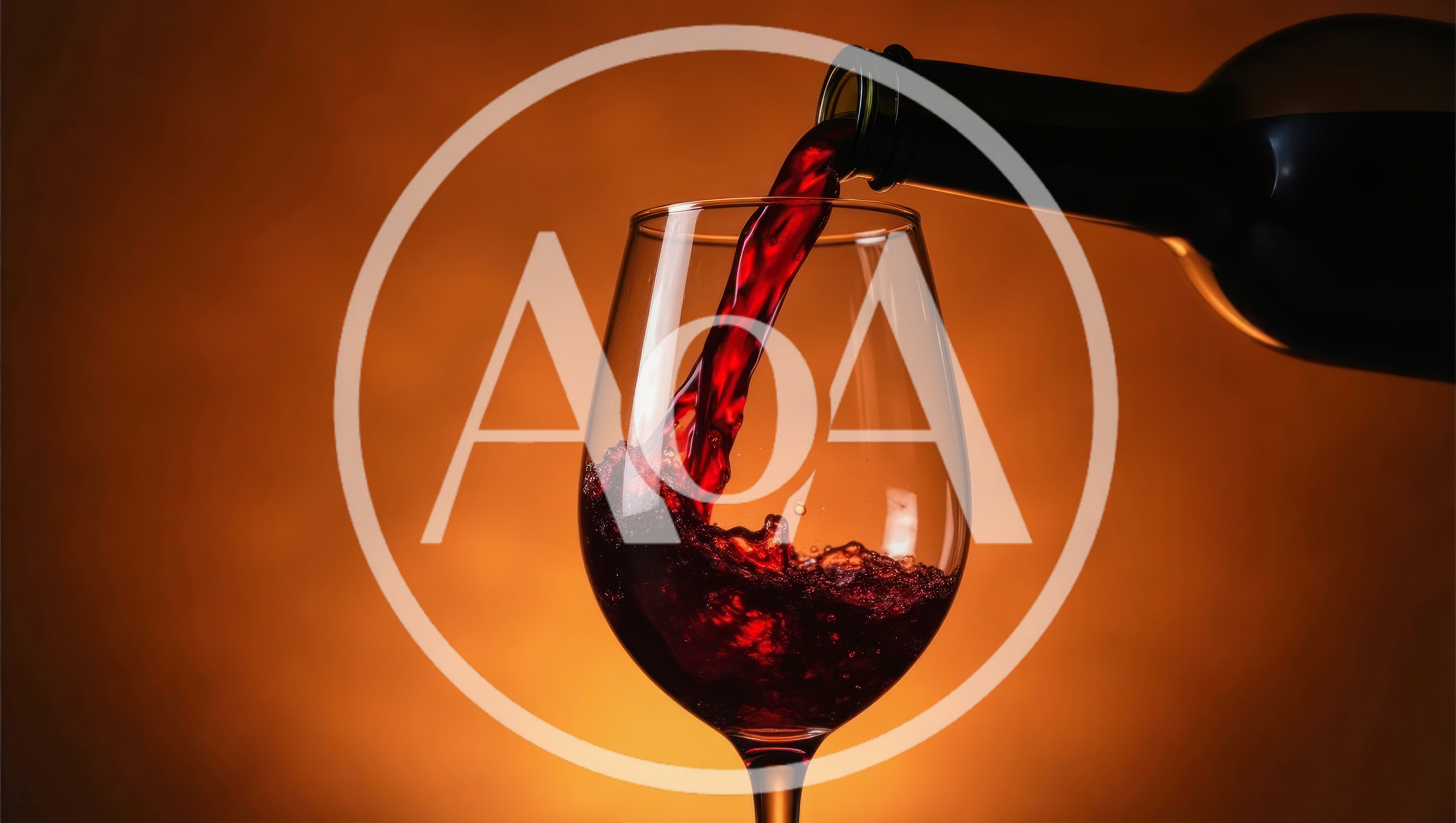Red Wine Pouring Into A Glass