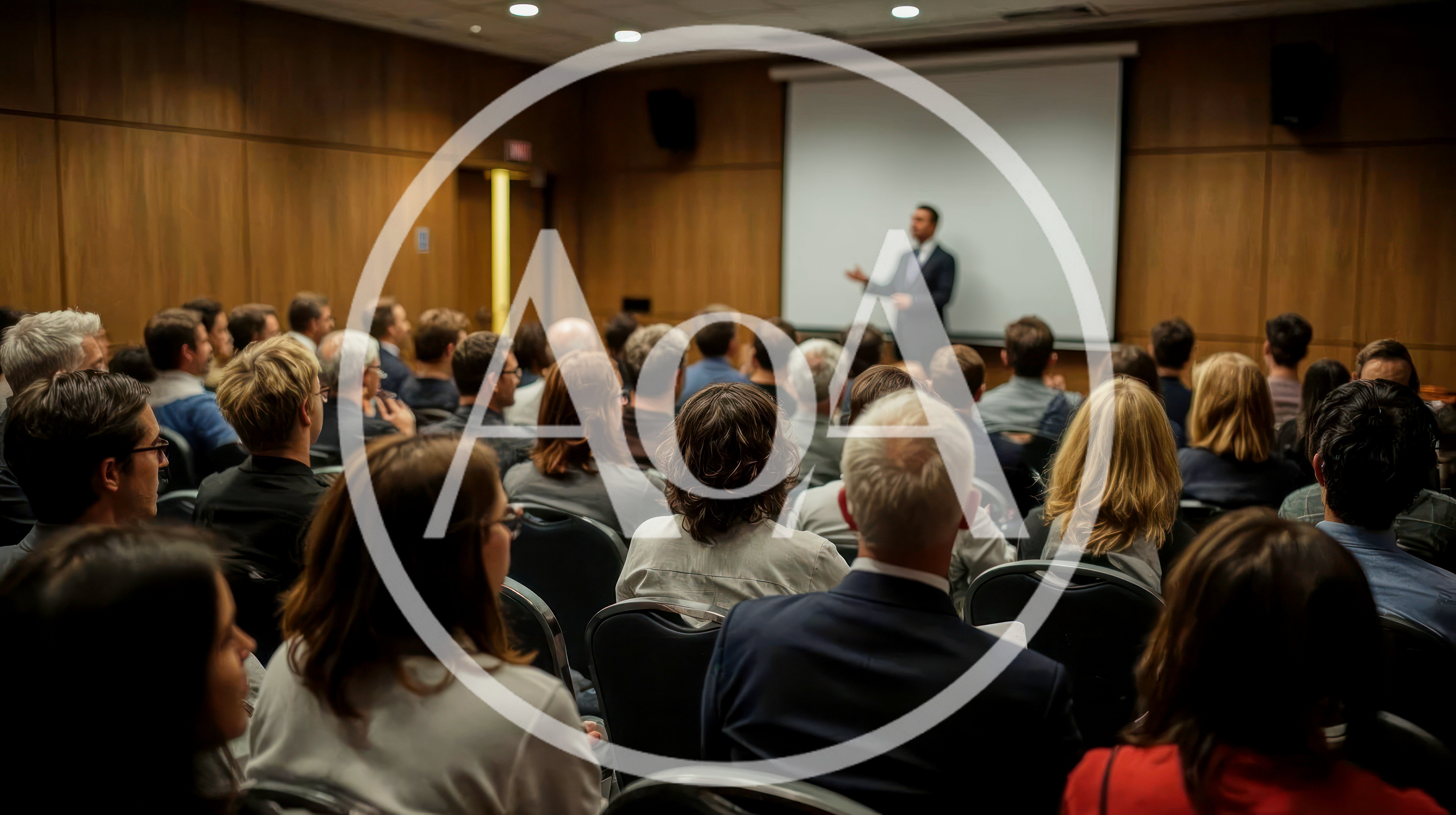 Professional Speaker Presenting To An Audience In Conference Room