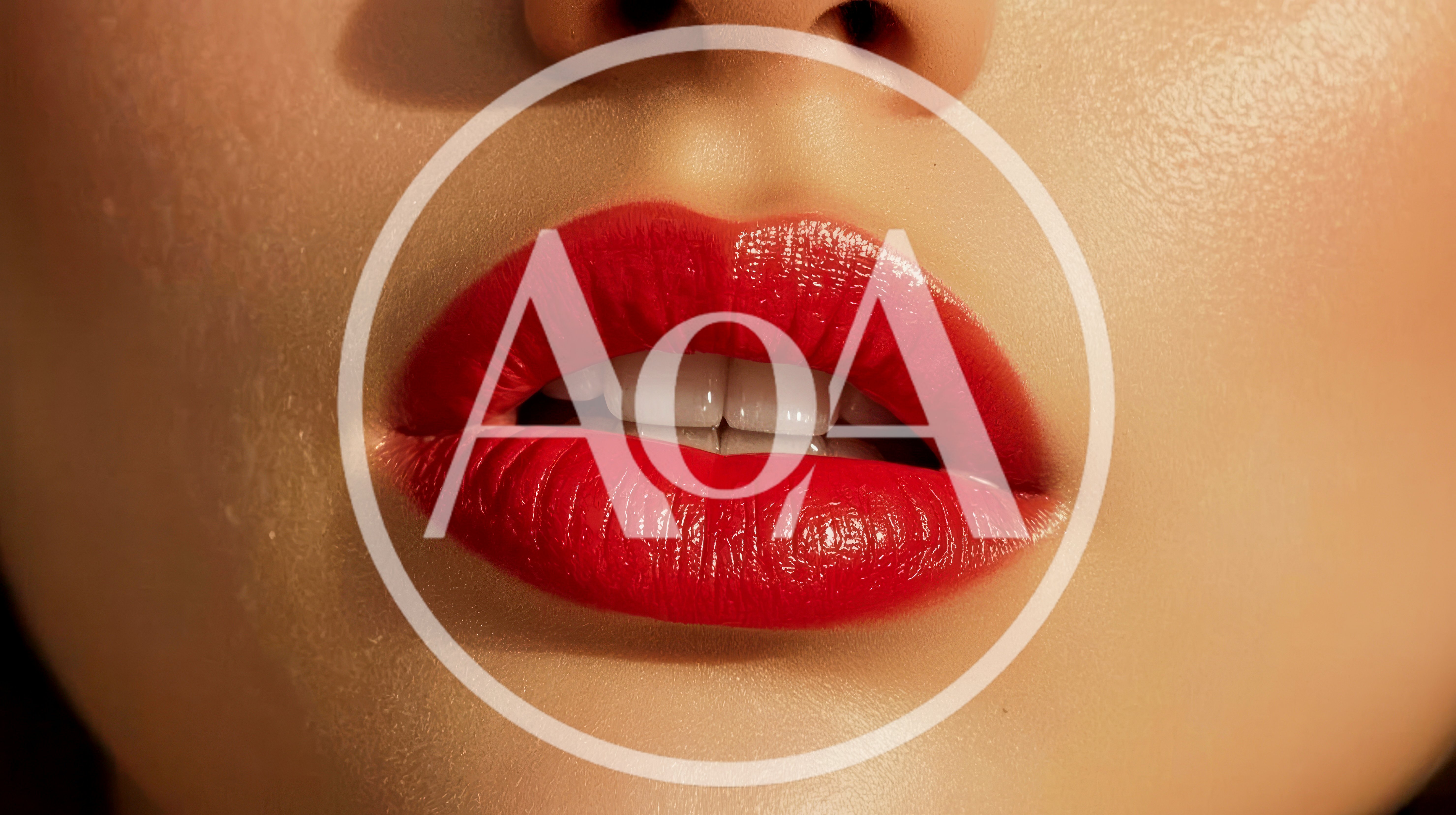 Close Up Of Woman With Vibrant Red Lipstick