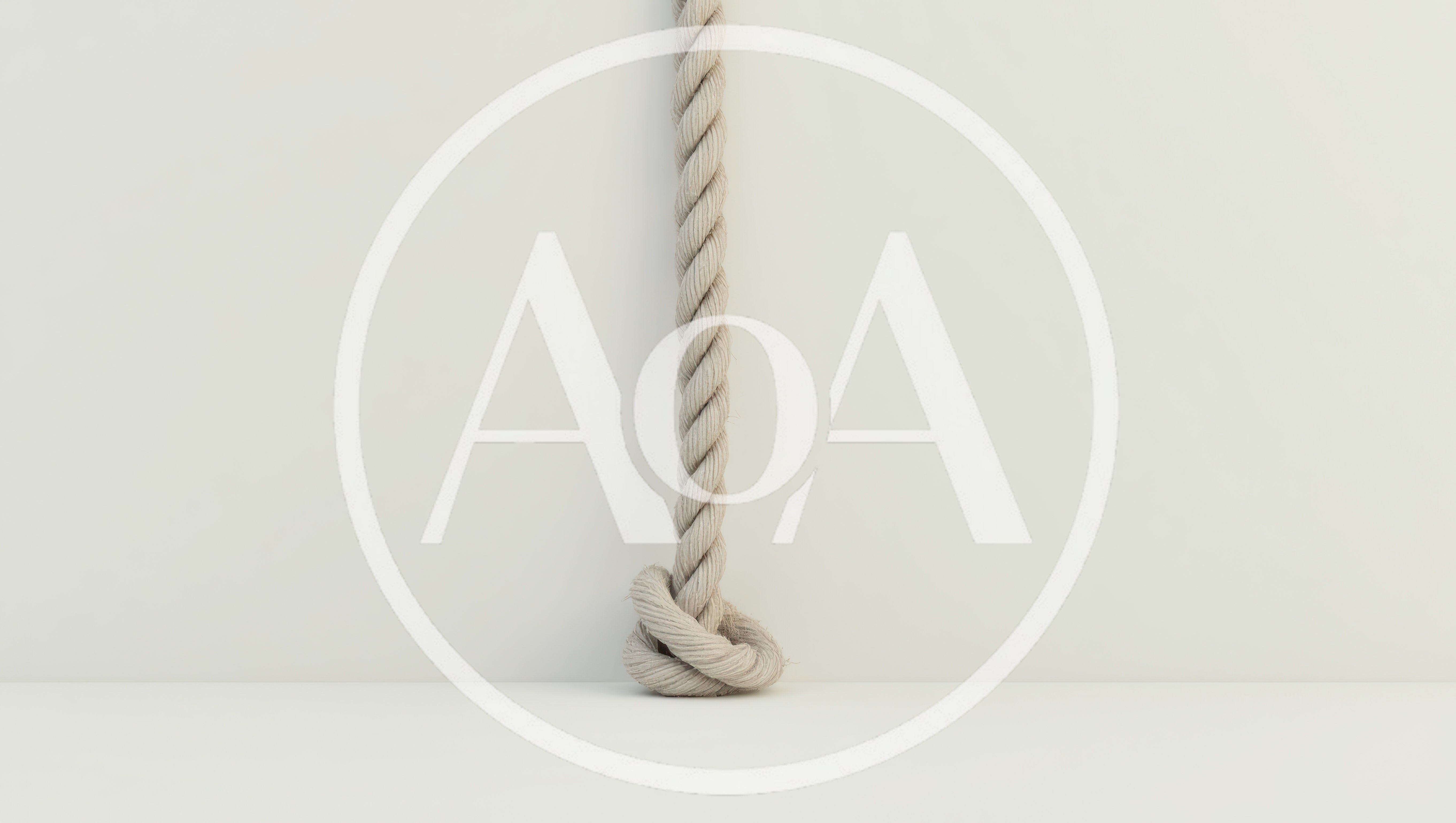 Thick Twisted Rope Hanging With A Knot