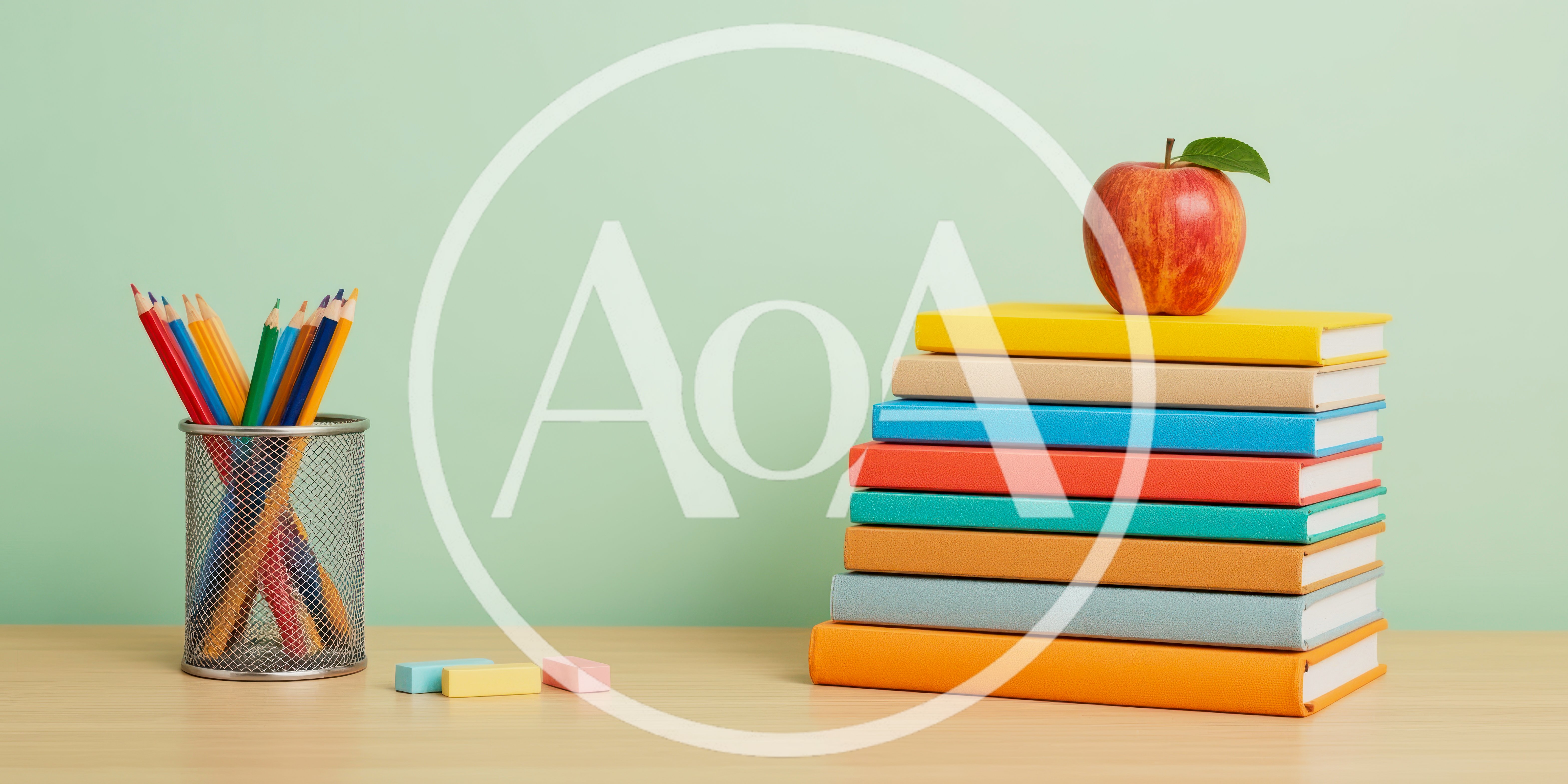 Stack of Colorful Books with Apple and Pencils