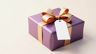 Purple Gift Box With Gold Ribbon And Blank Tag
