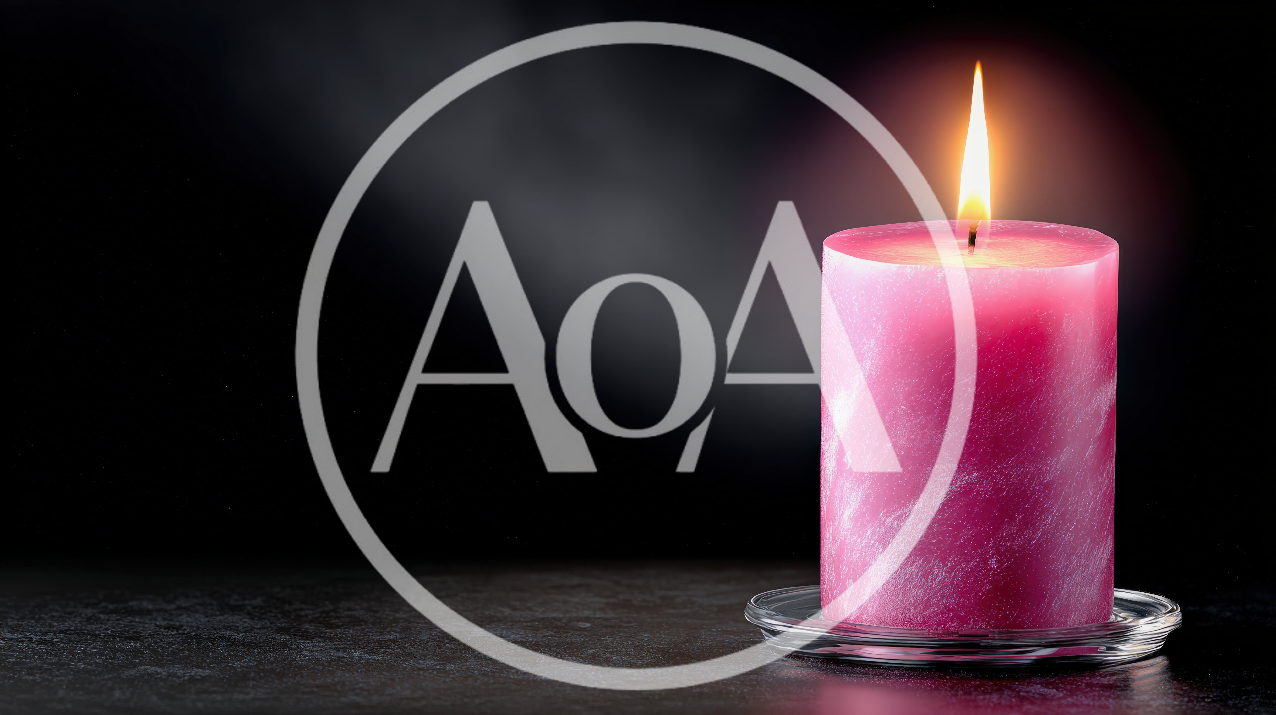 Pink Pillar Candle Burning on a Dark Surface